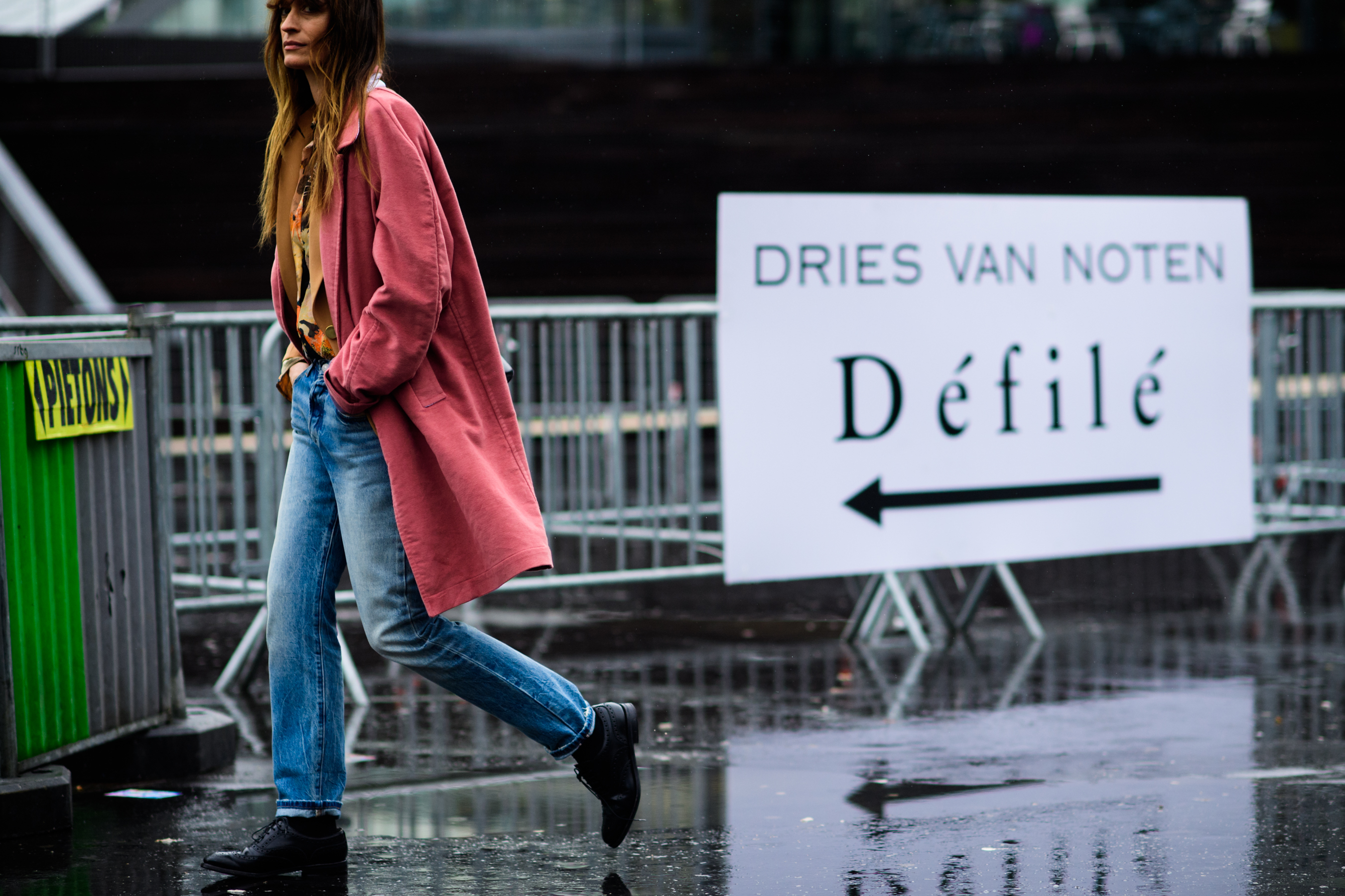 Top French model wearing pink coat
