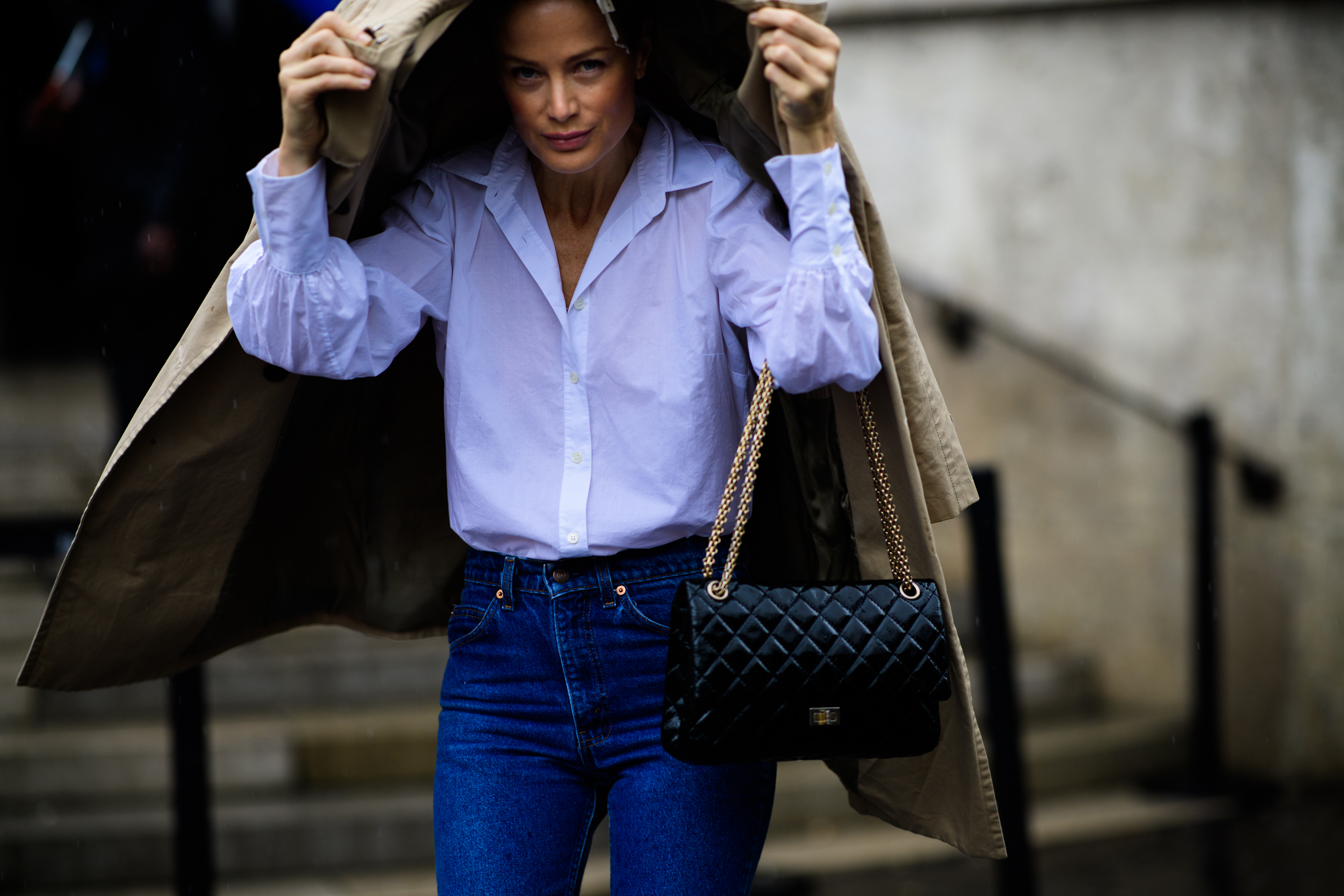 Woman wearing white shirt and denim