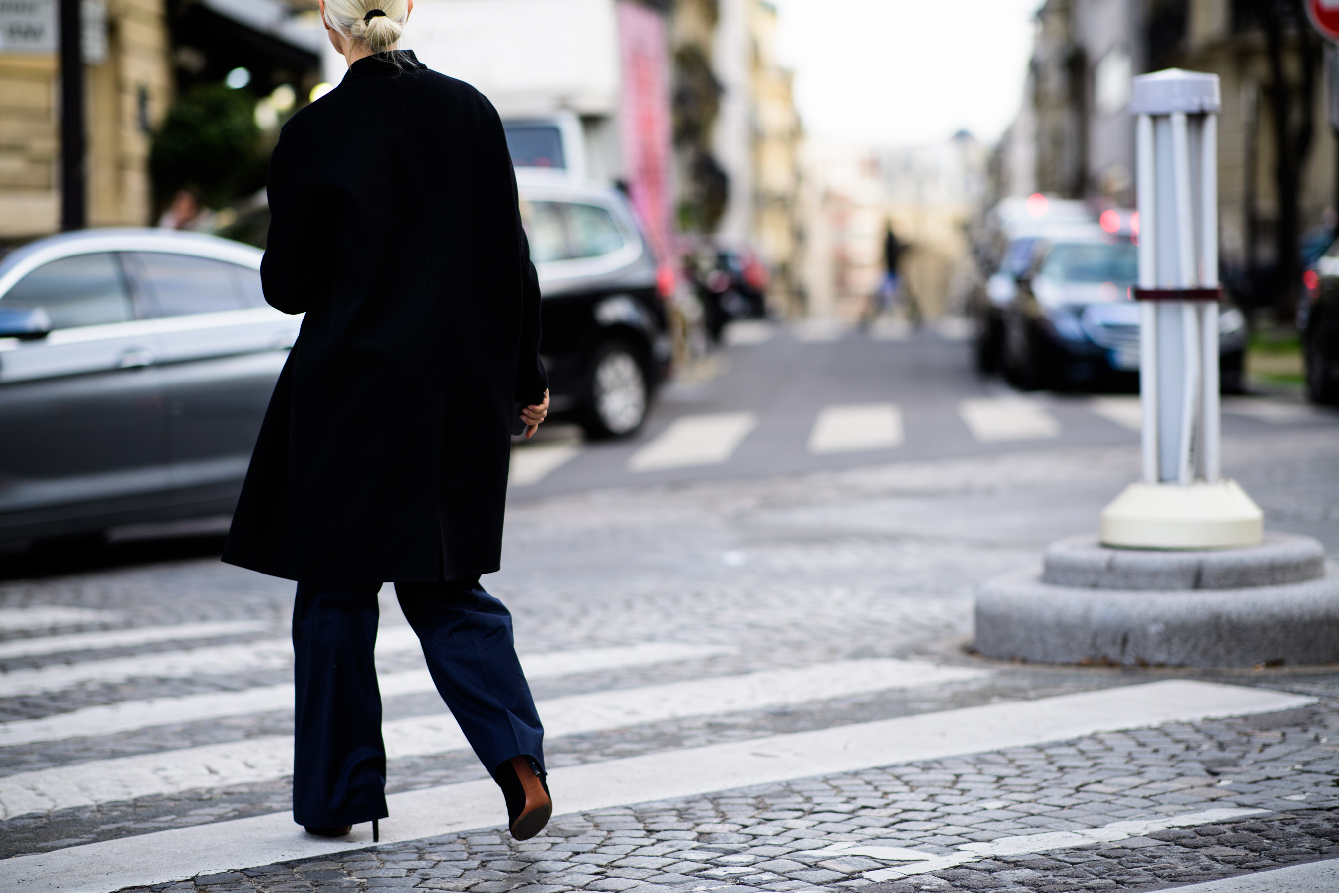 German stylist wearing all black