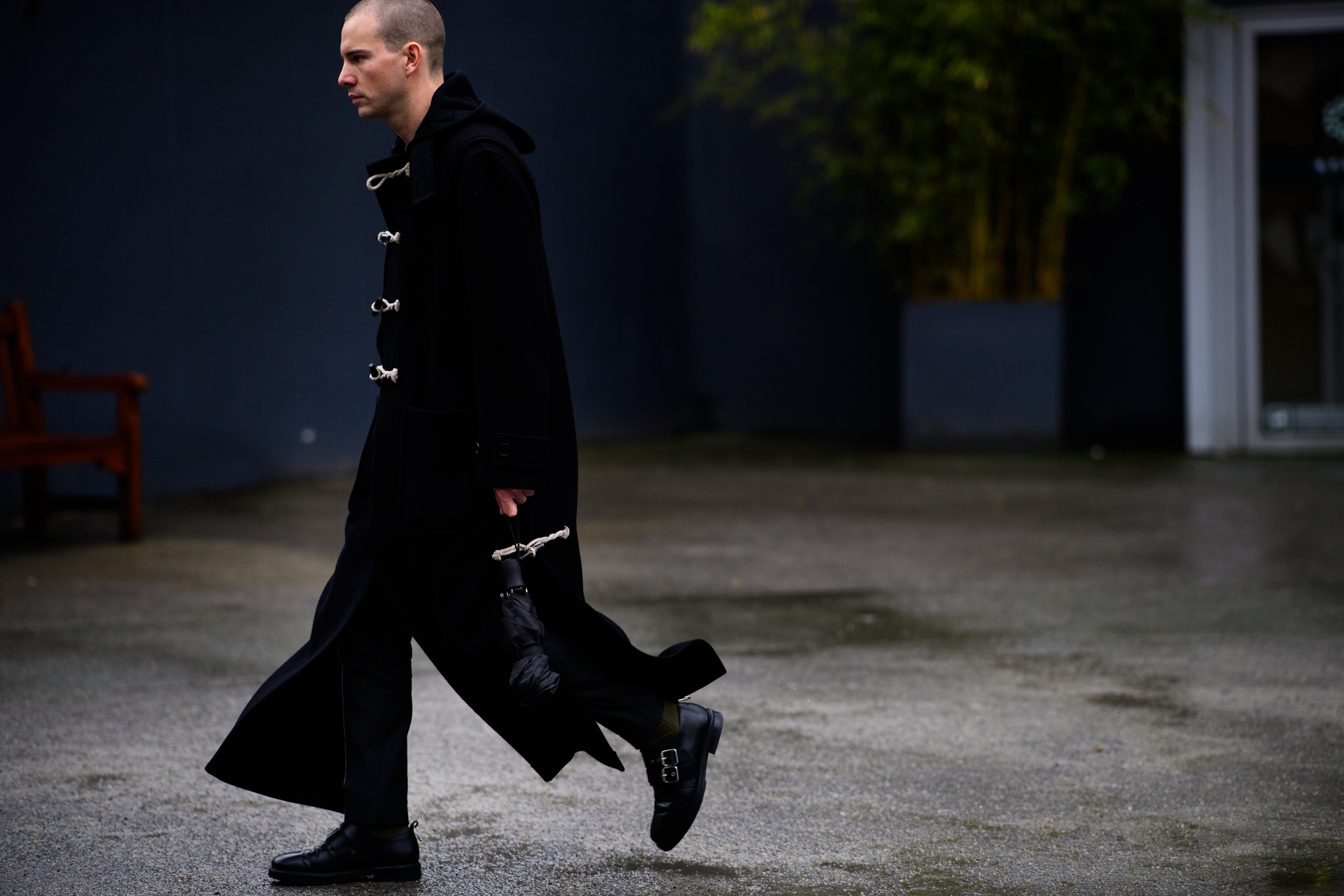 A Magazine editor wearing all black