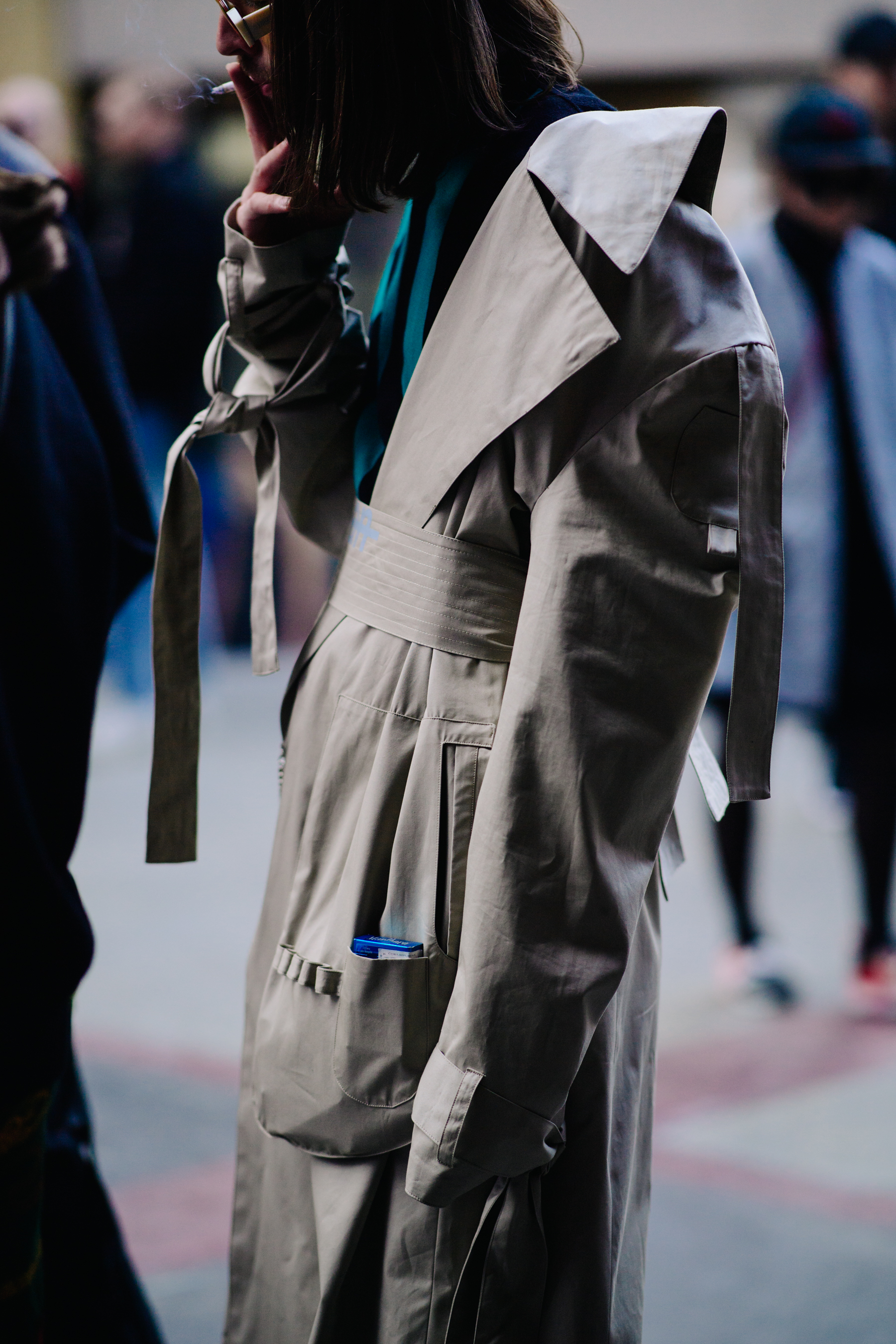Man wearing beige trench coat