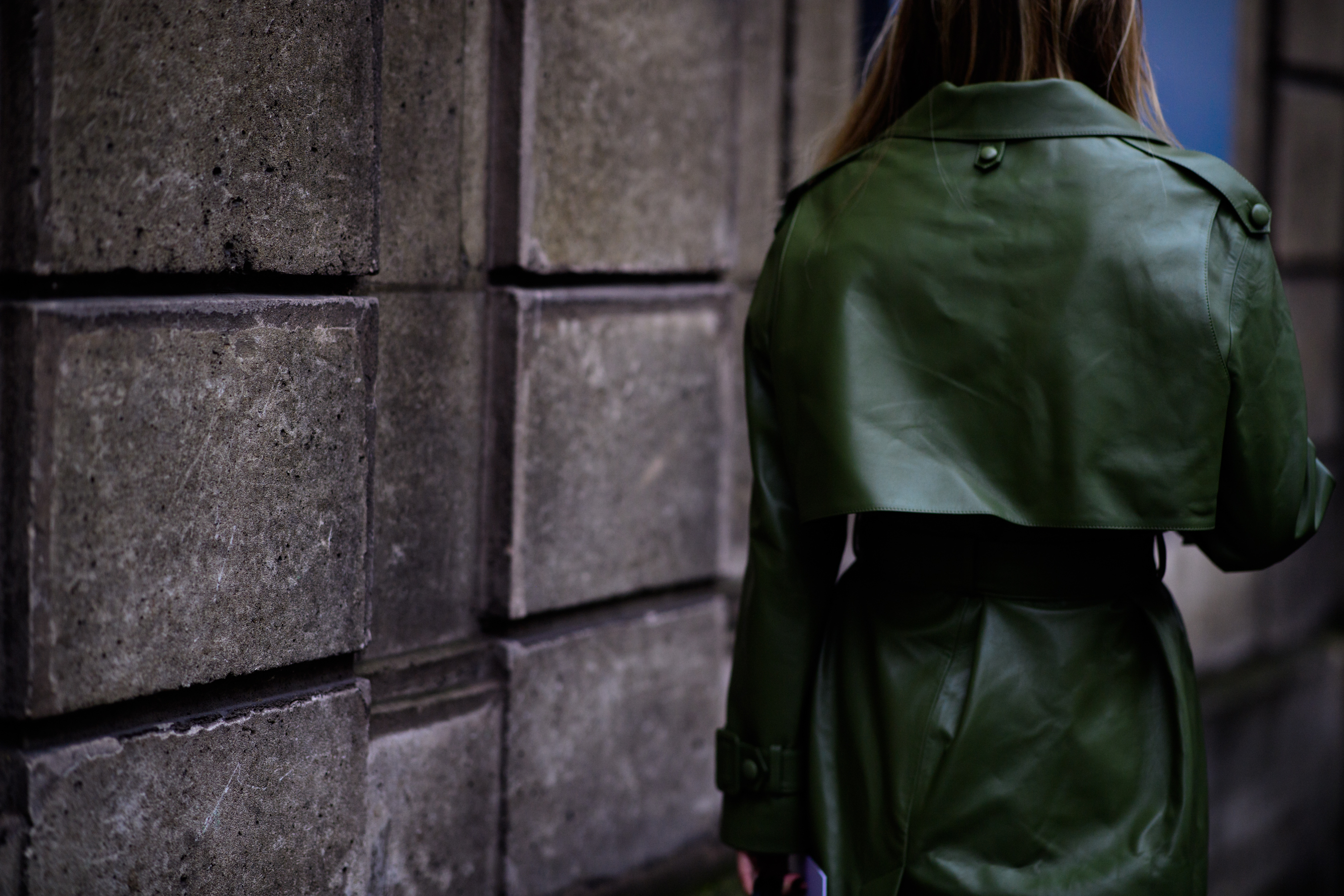 Russian ELLE editor wearing green coat
