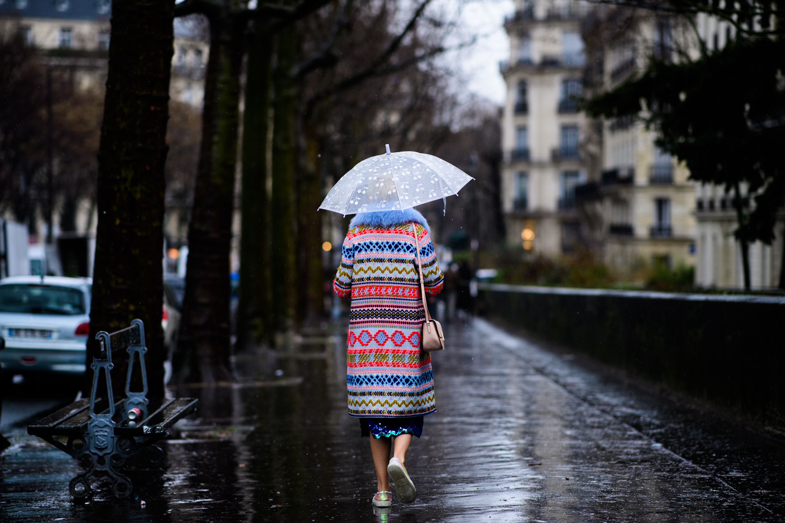 Woman wearing colourful printed coat