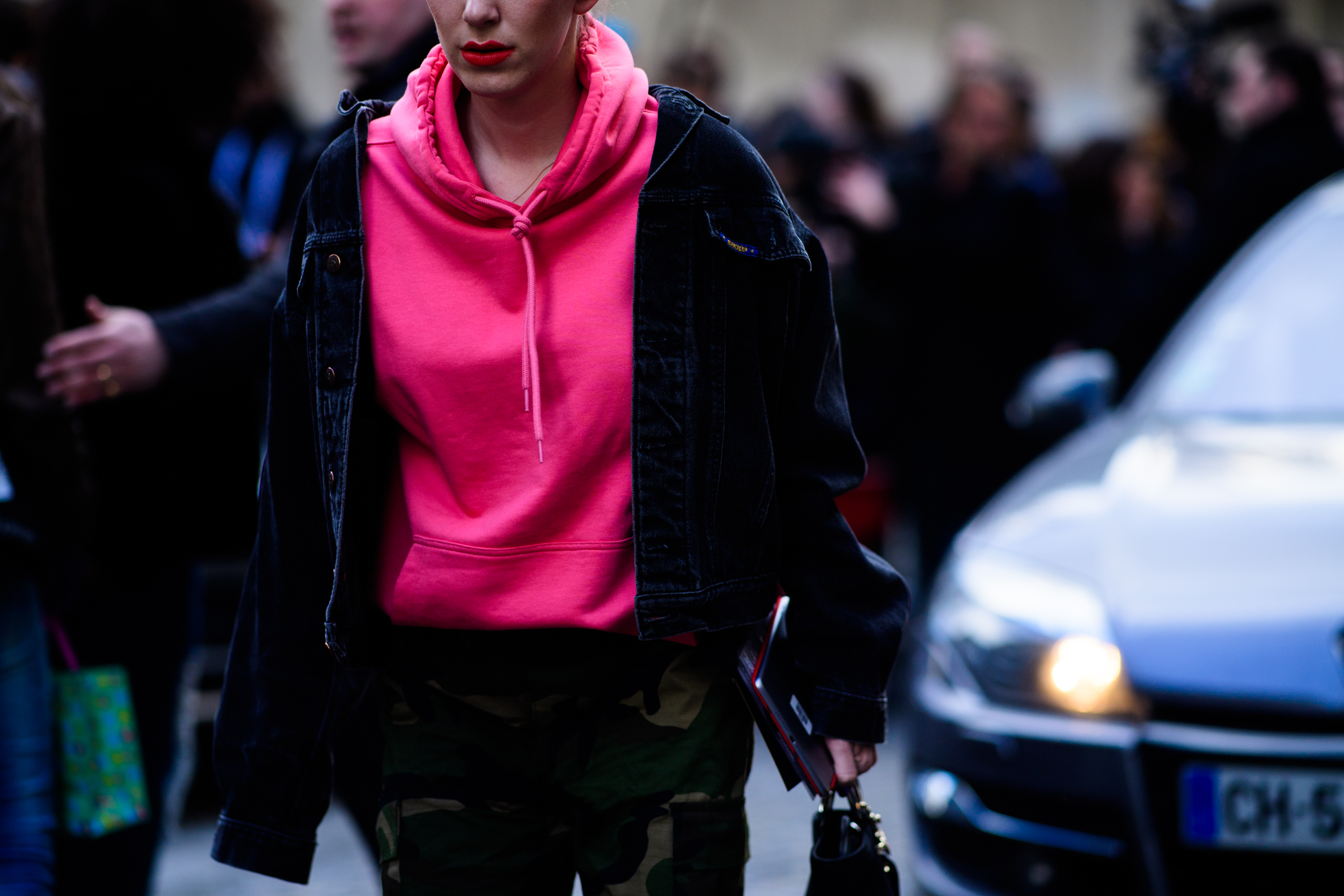 Woman wearing pink hoodie