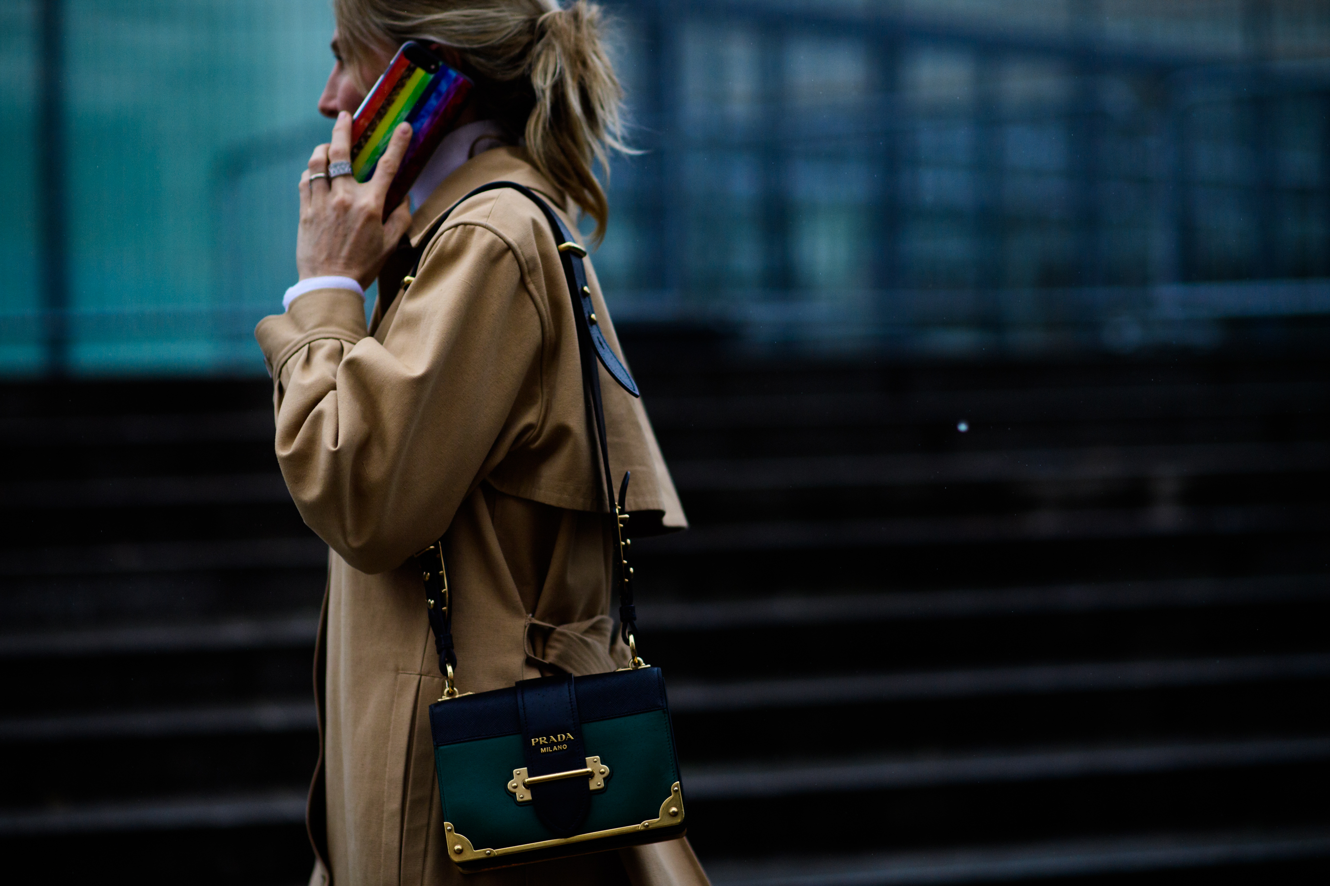 Woman wearing Prada shoulder bag