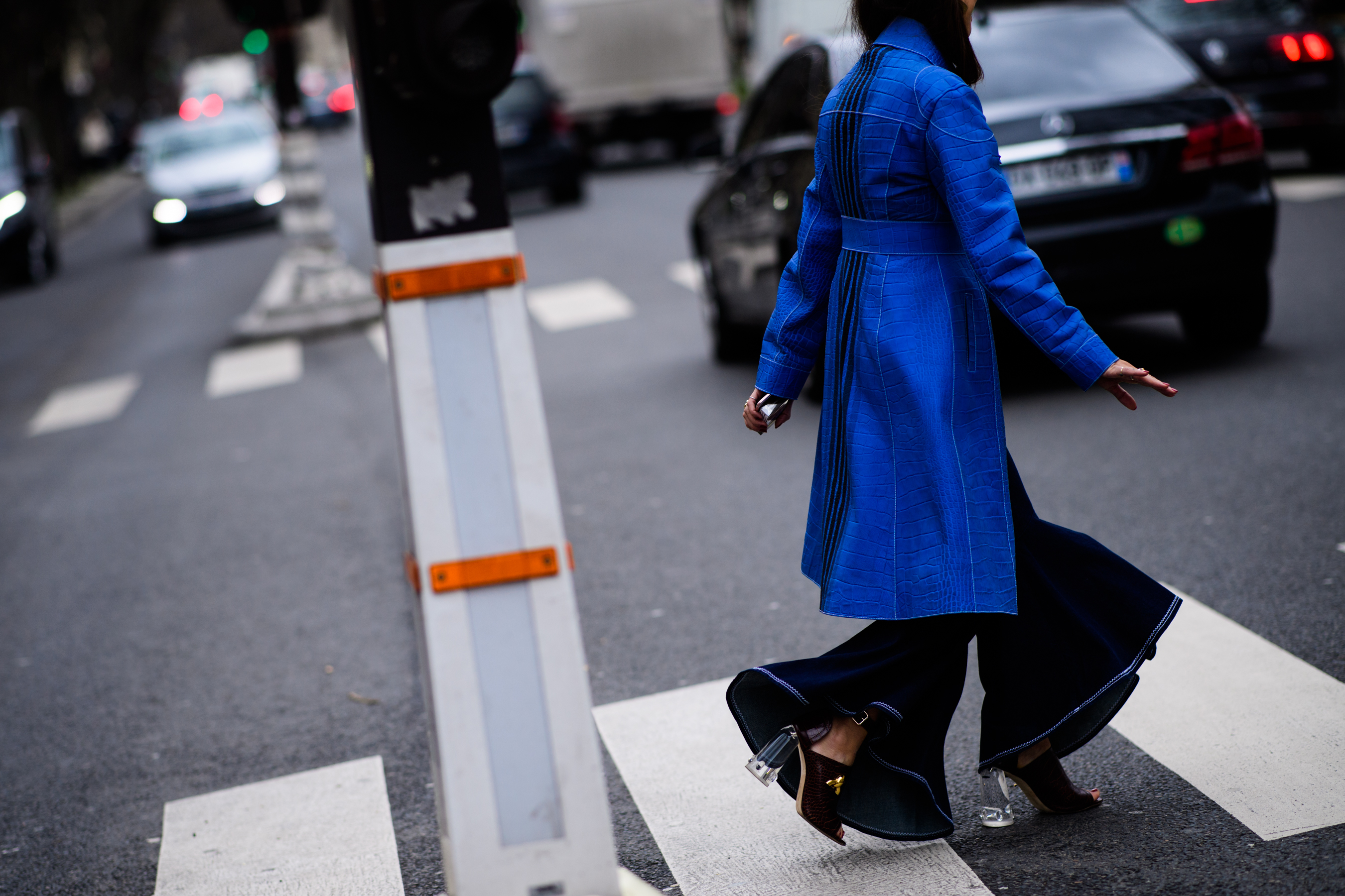 Italian woman wearing blue coat