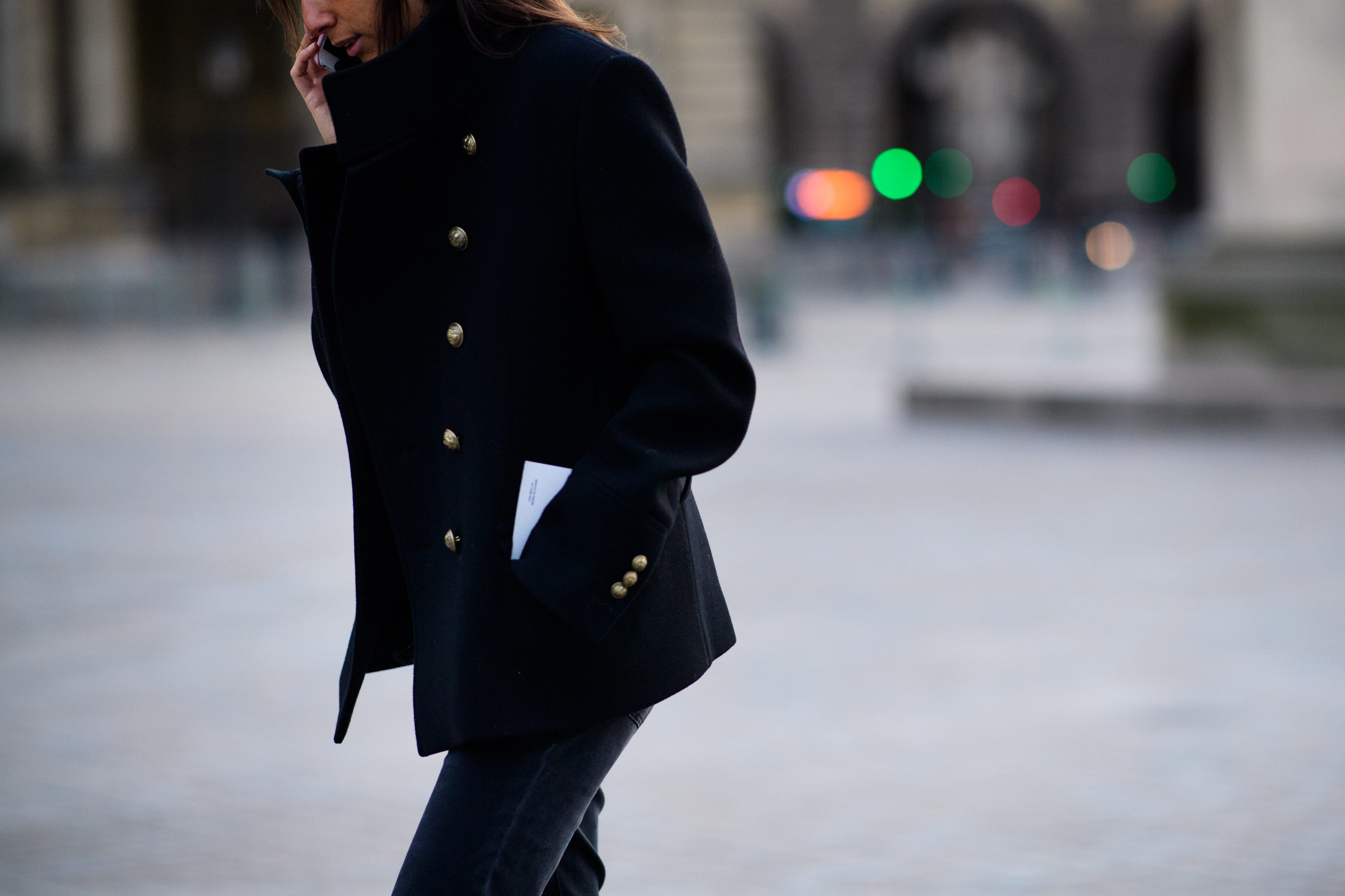 Woman wearing military style jacket
