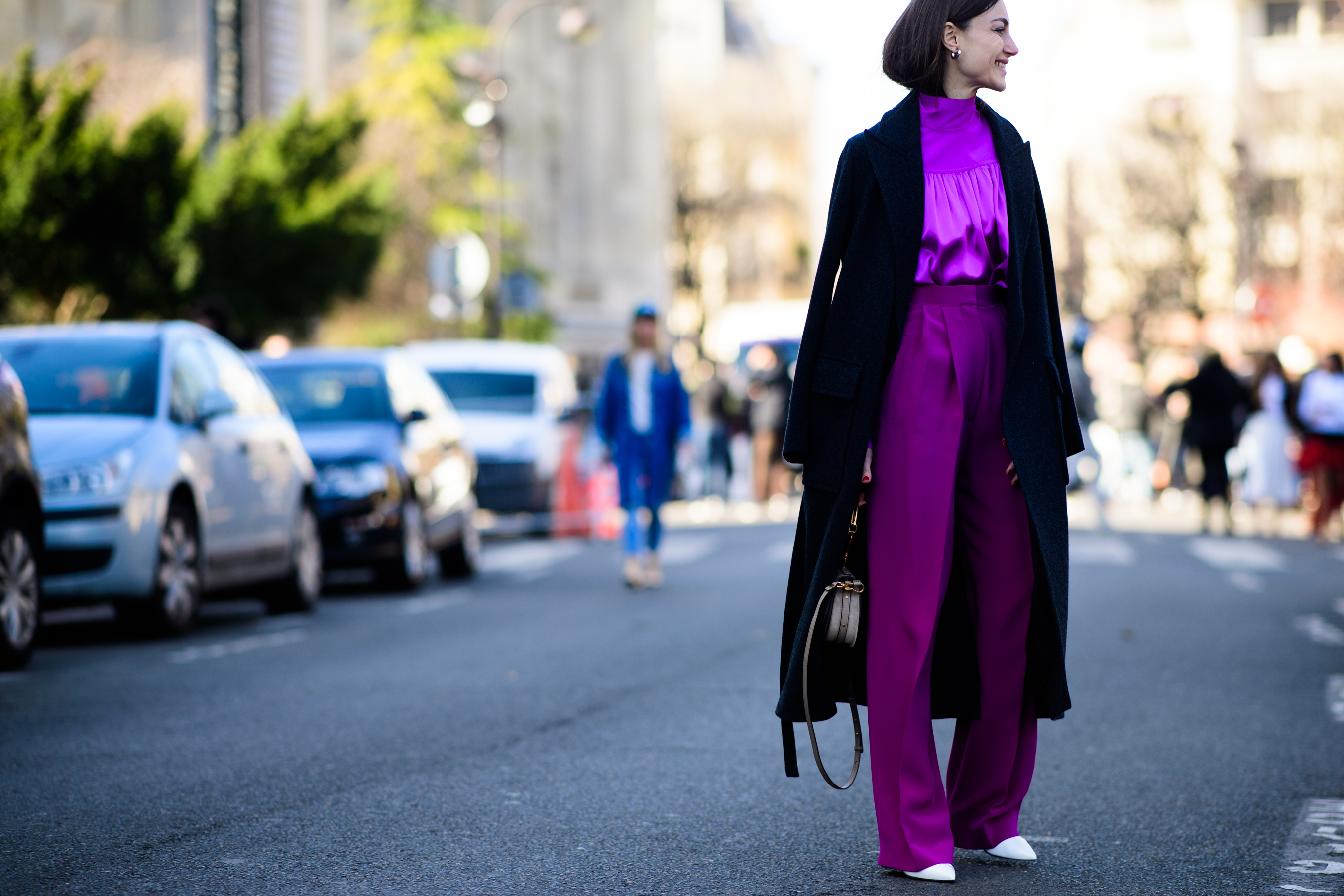 Italian woman wearing fuschia outfit
