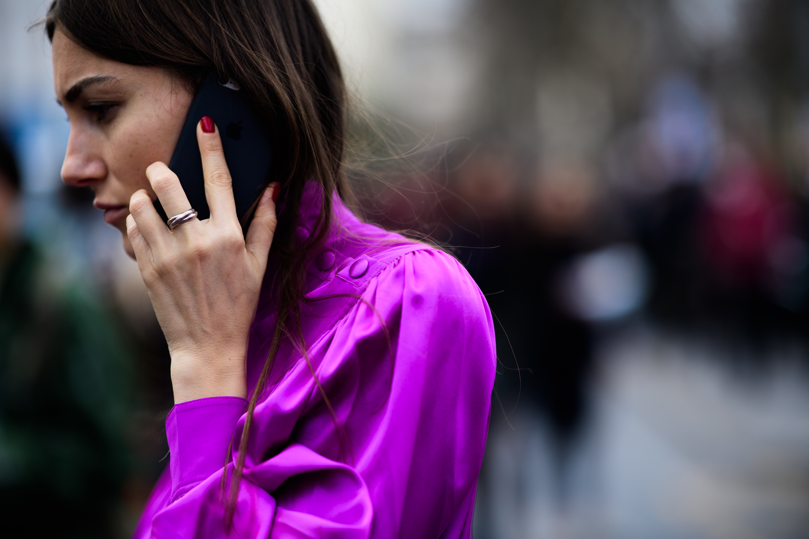 Italian woman wearing fuschia outfit