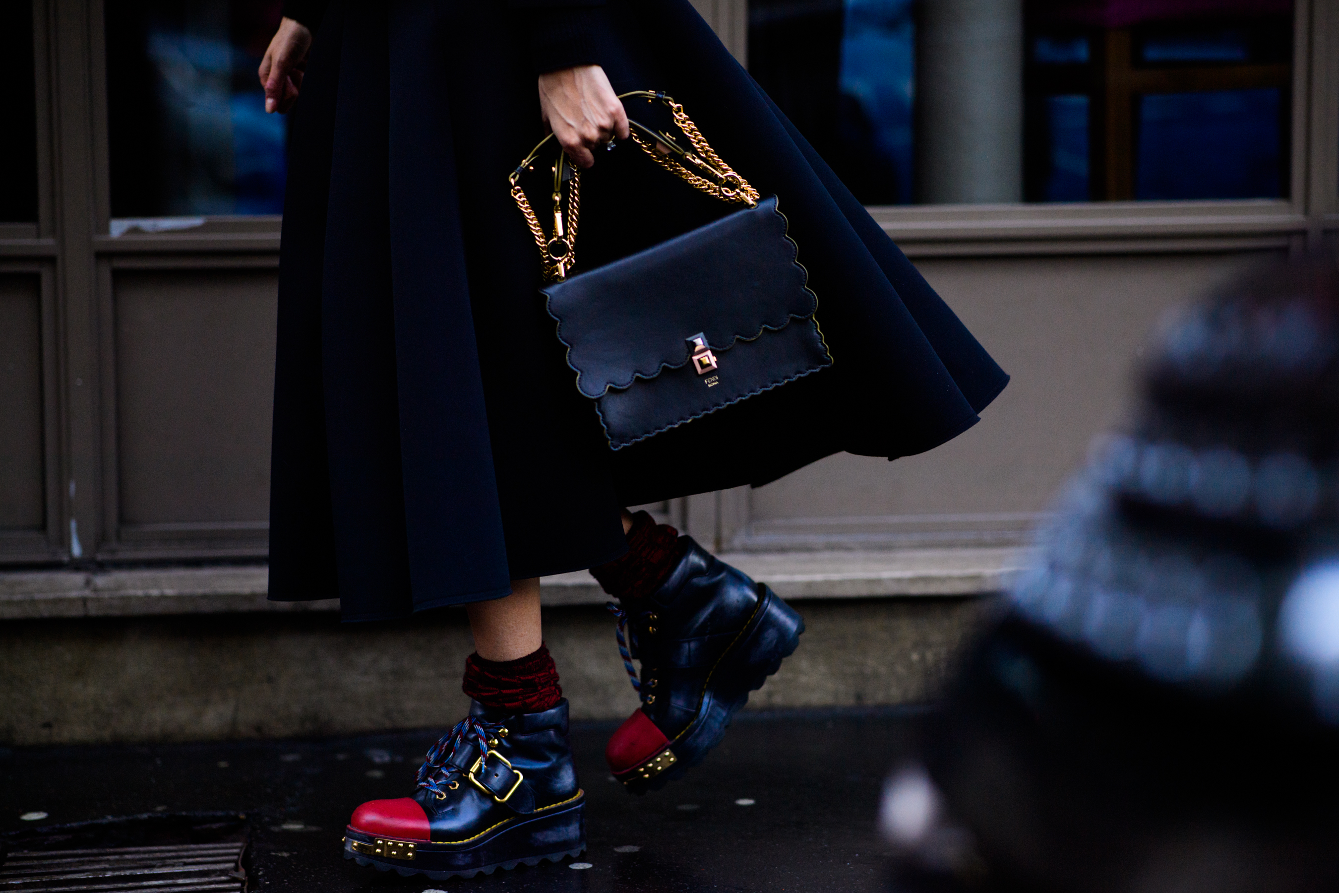 Italian stylist wearing Prada boots