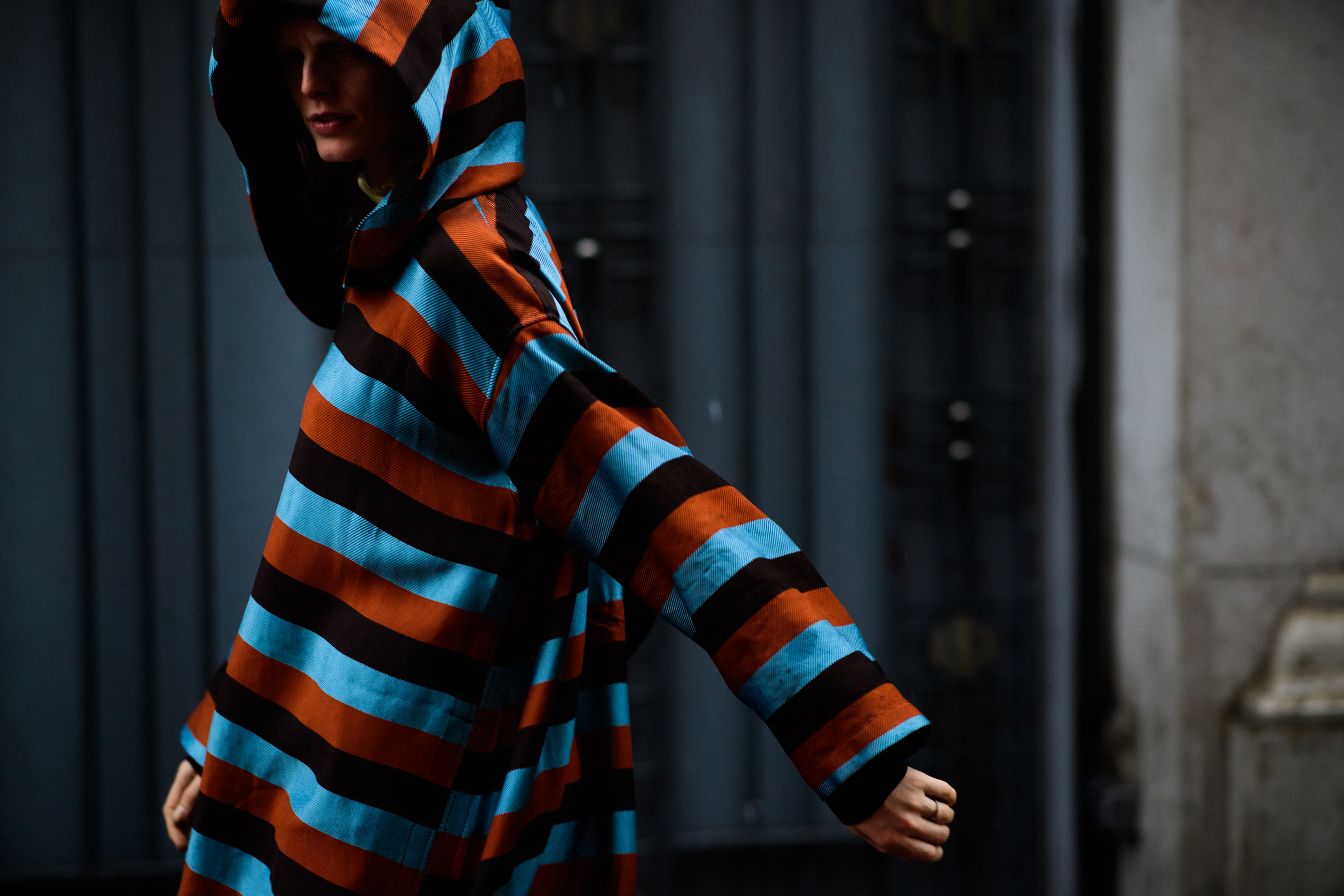 Belgian model wearing stripy hoodie