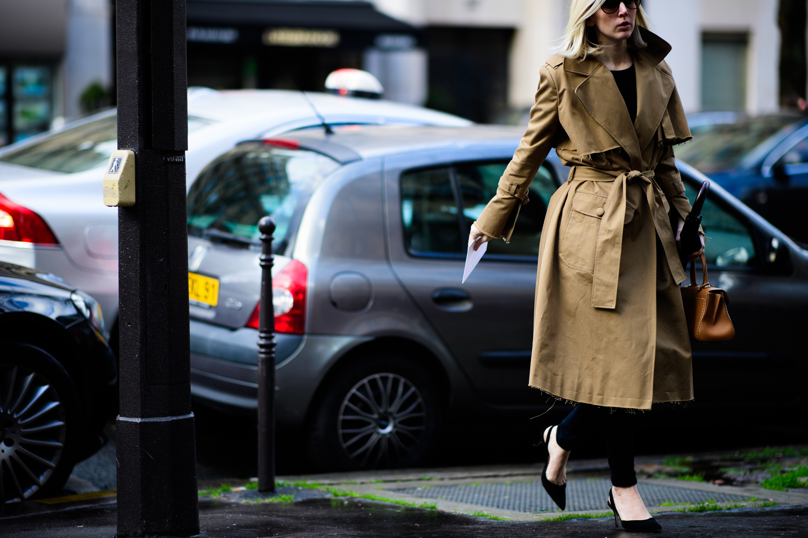 Woman wearing beige trench coat