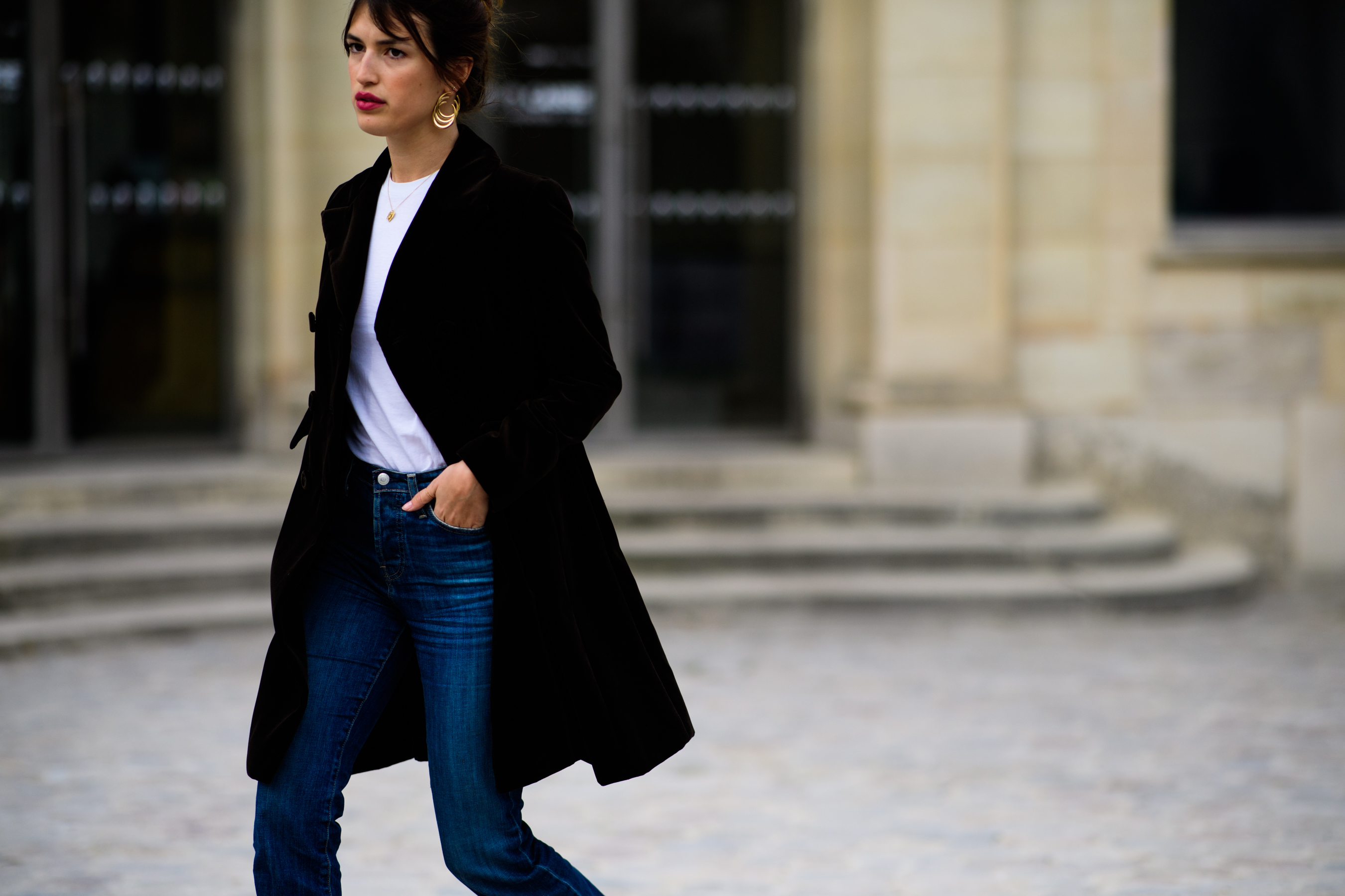 French woman wearing black coat