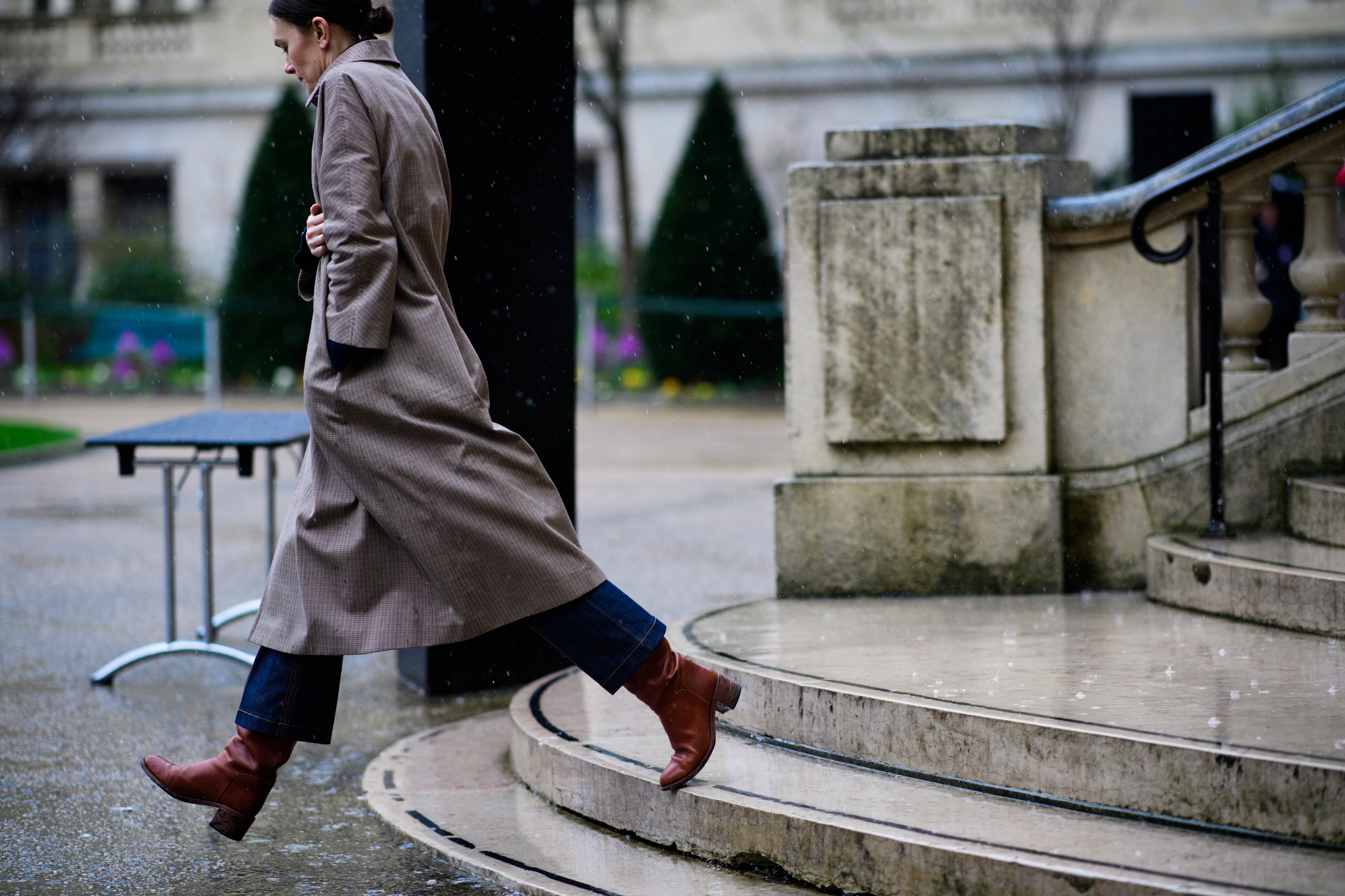 British editor wearing brown coat