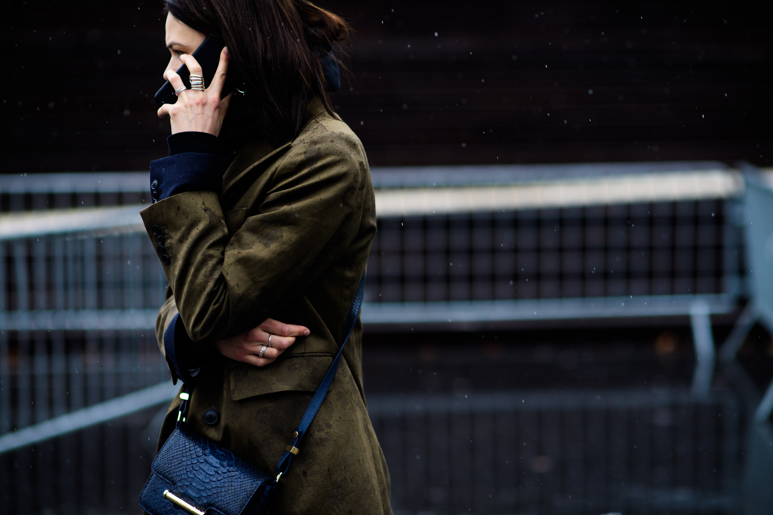 Model wearing green coat after the show