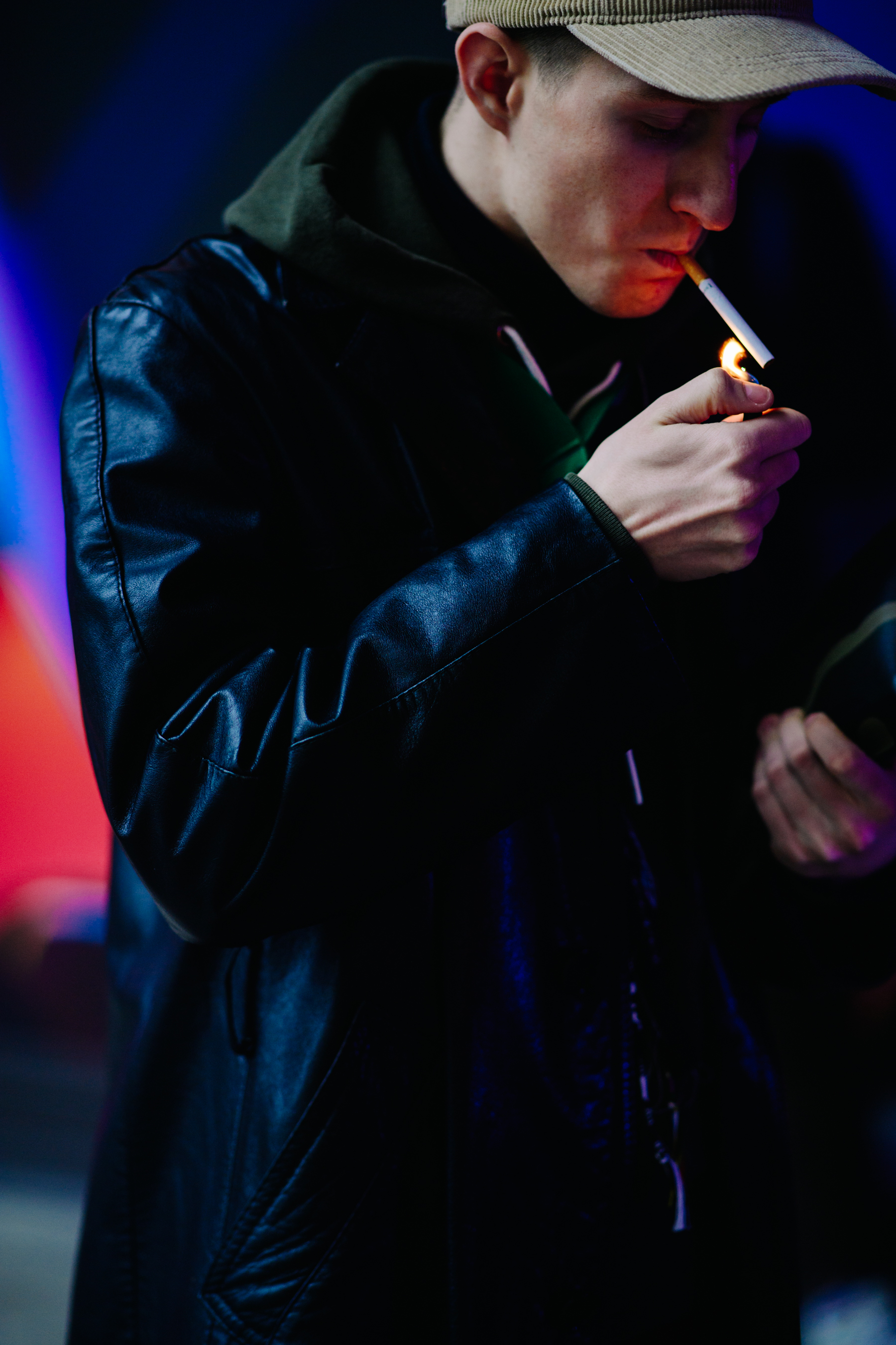 Boy wearing black leather jacket