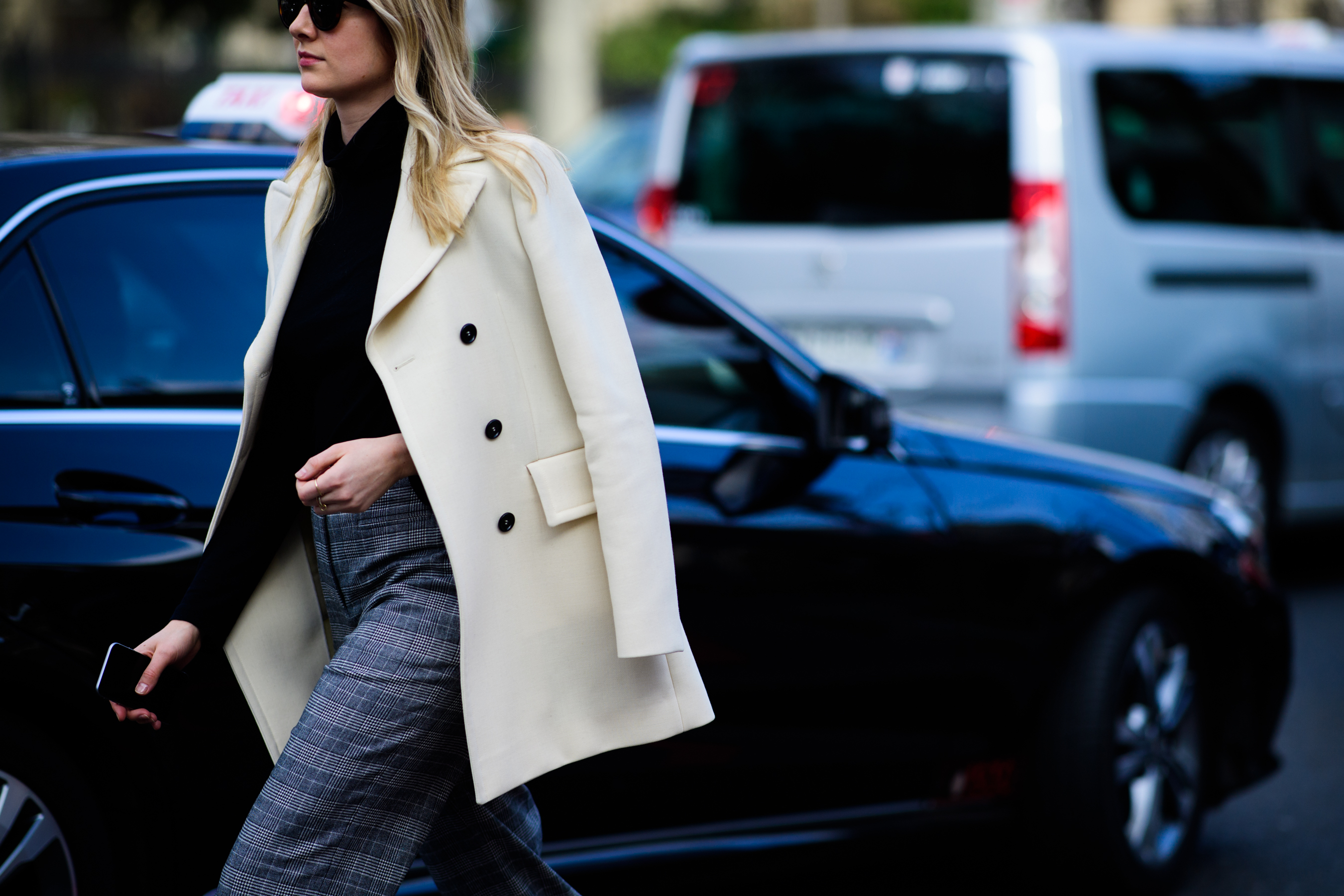 Woman wearing white coat