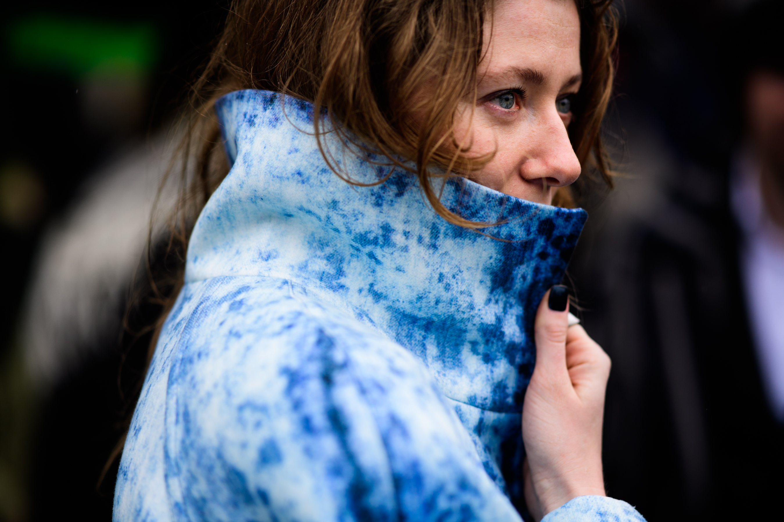 Ukrainian editor wearing blue coat