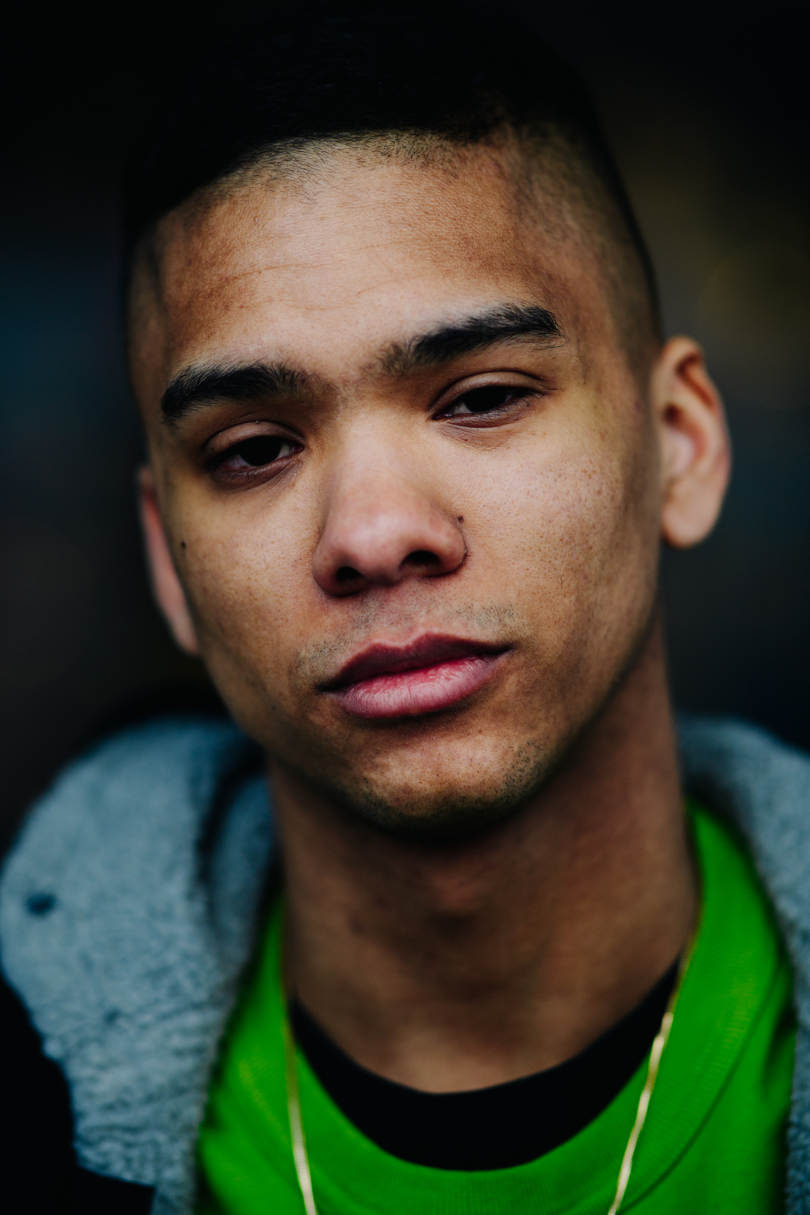 Portrait of a boy wearing green t-shirt