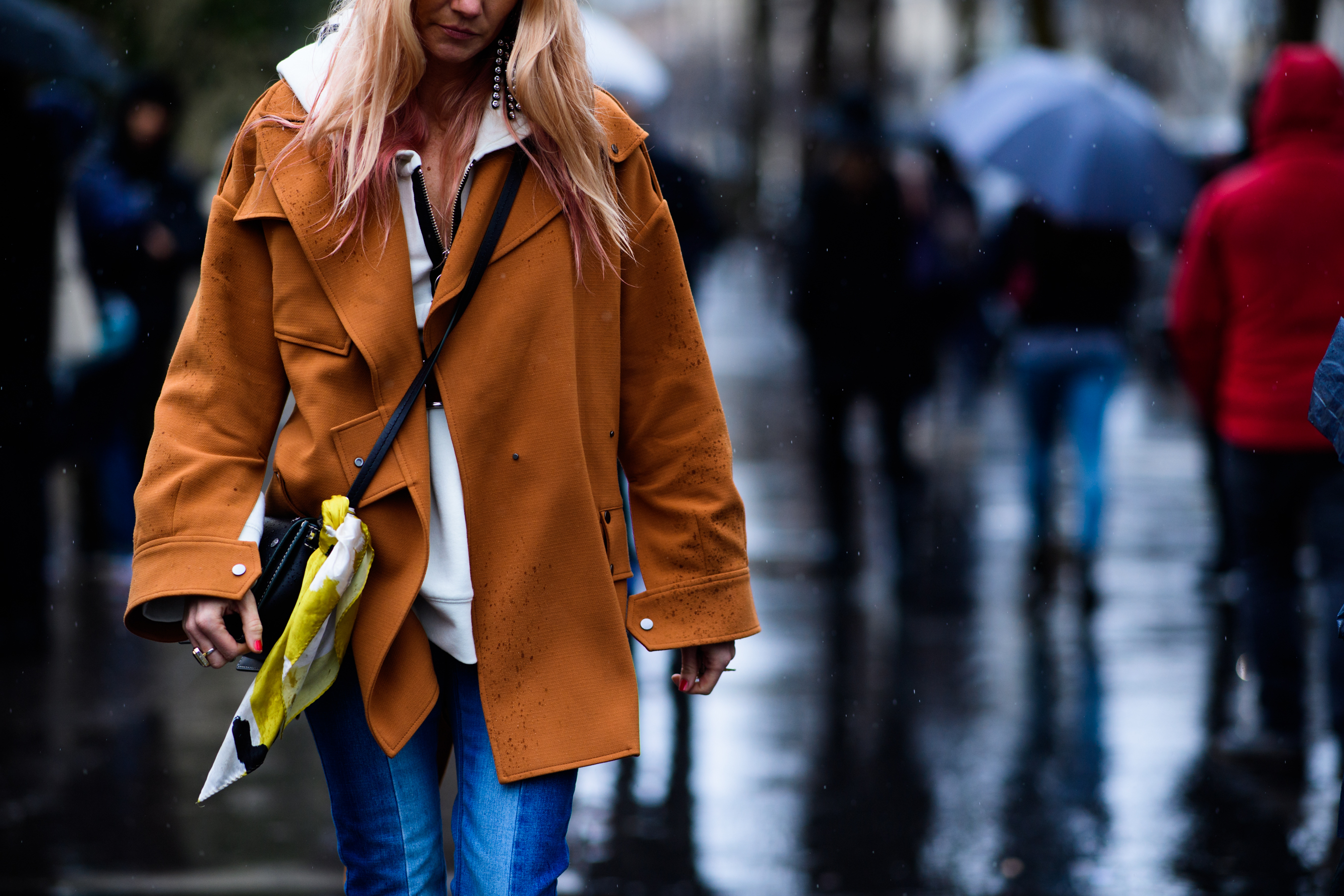 Woman wearing orange coat