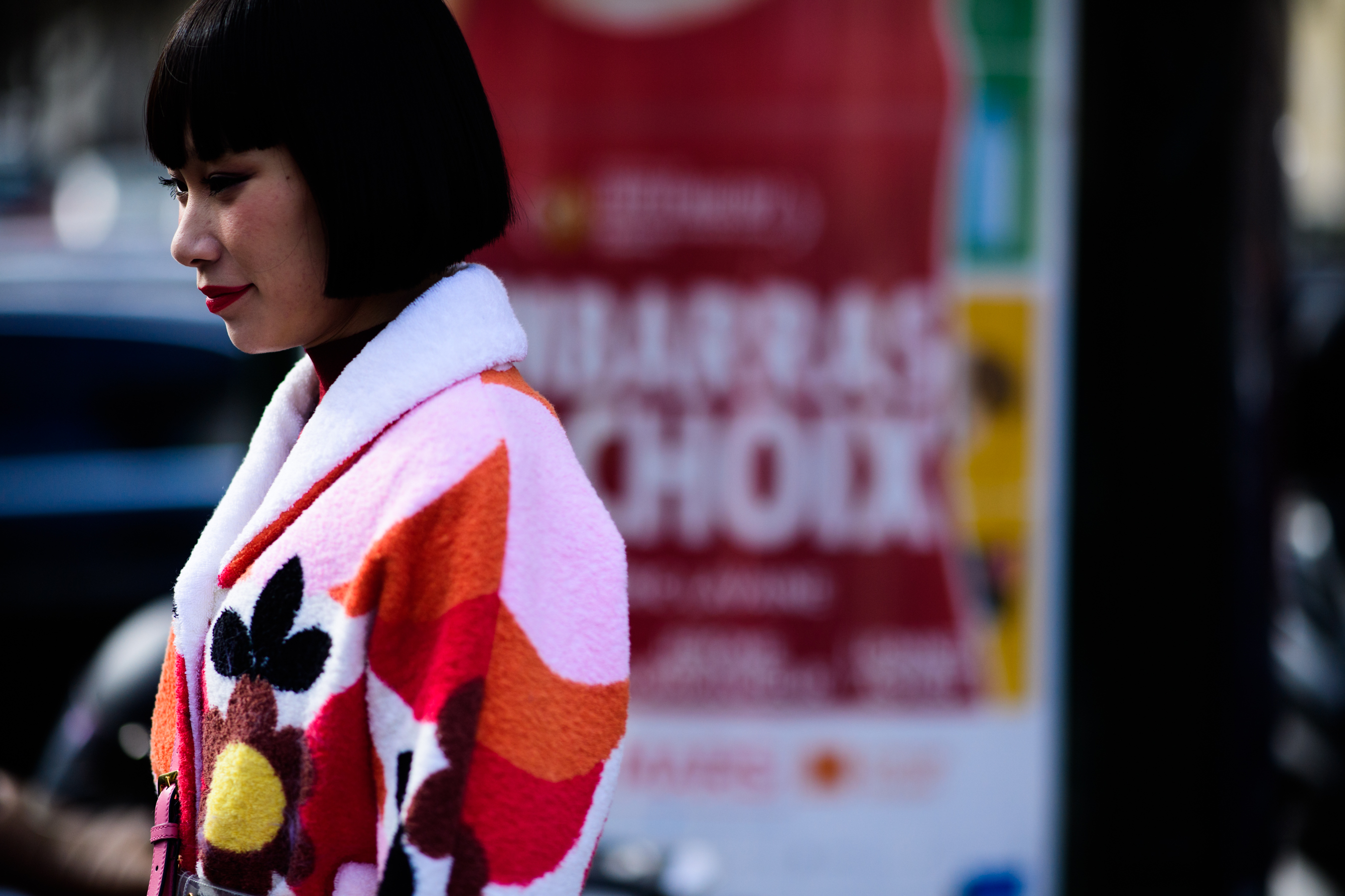 Woman wearing Miu Miu fur coat