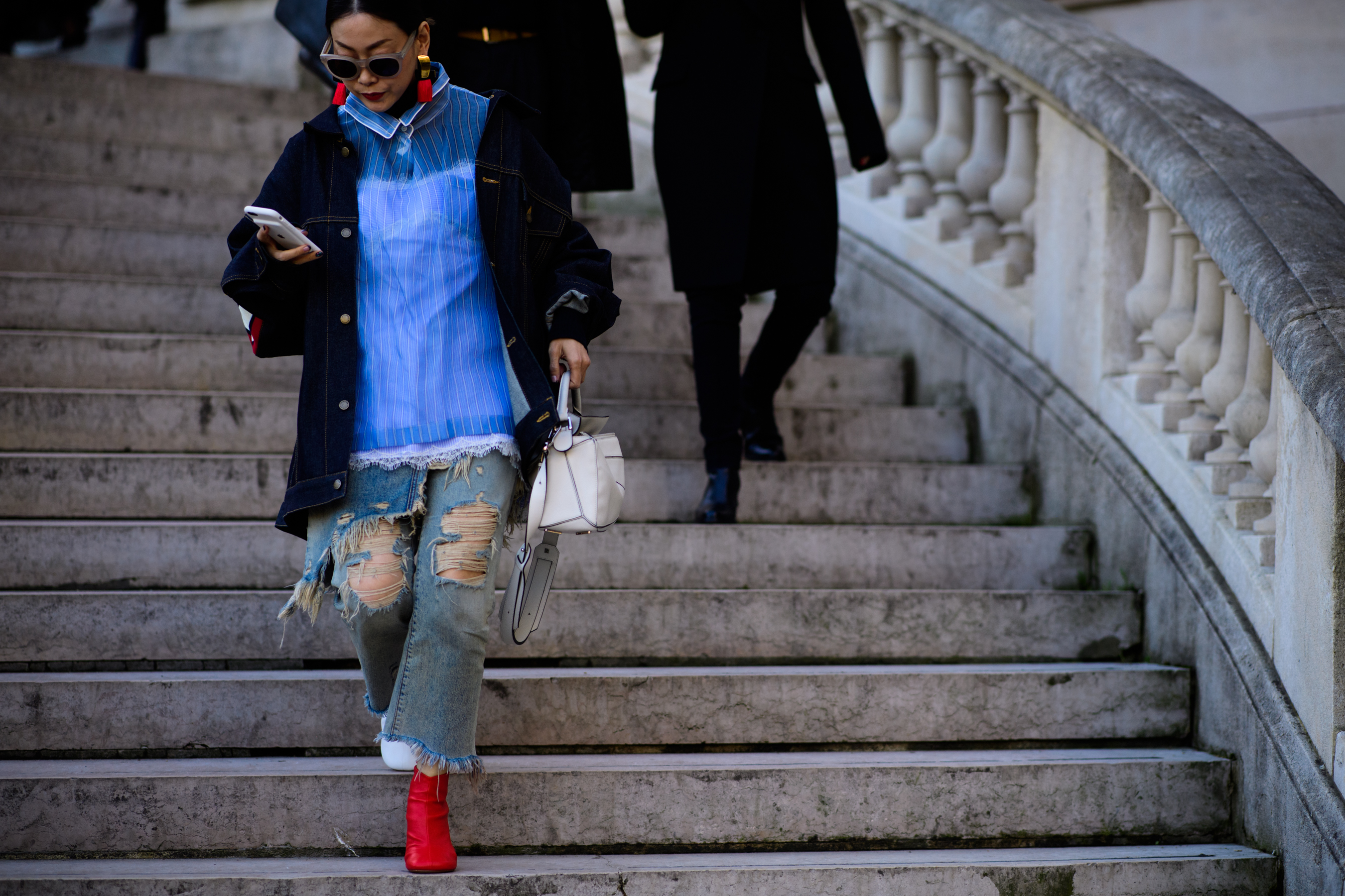 Woman wearing ripped jeans