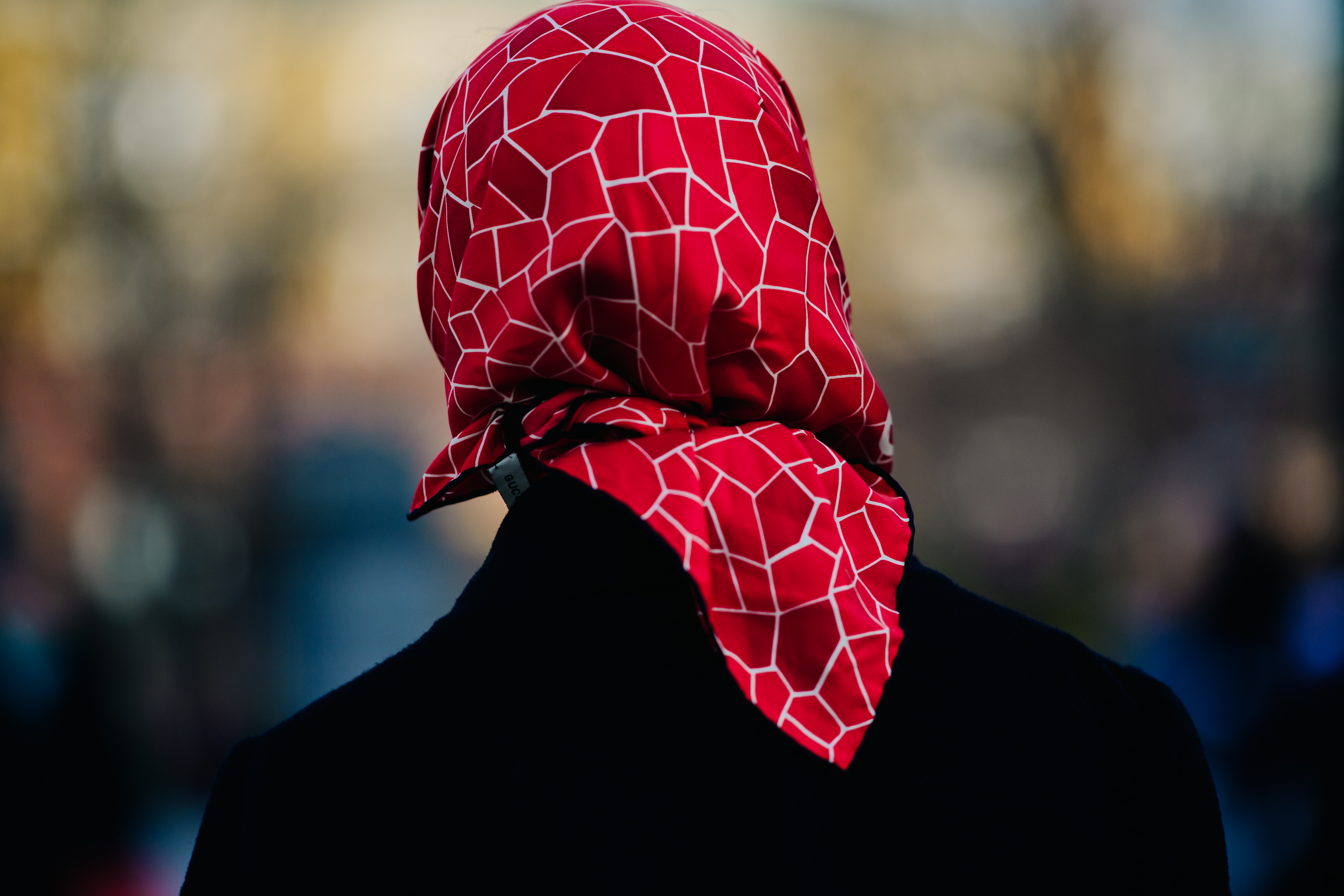 Girl wearing red head scarf