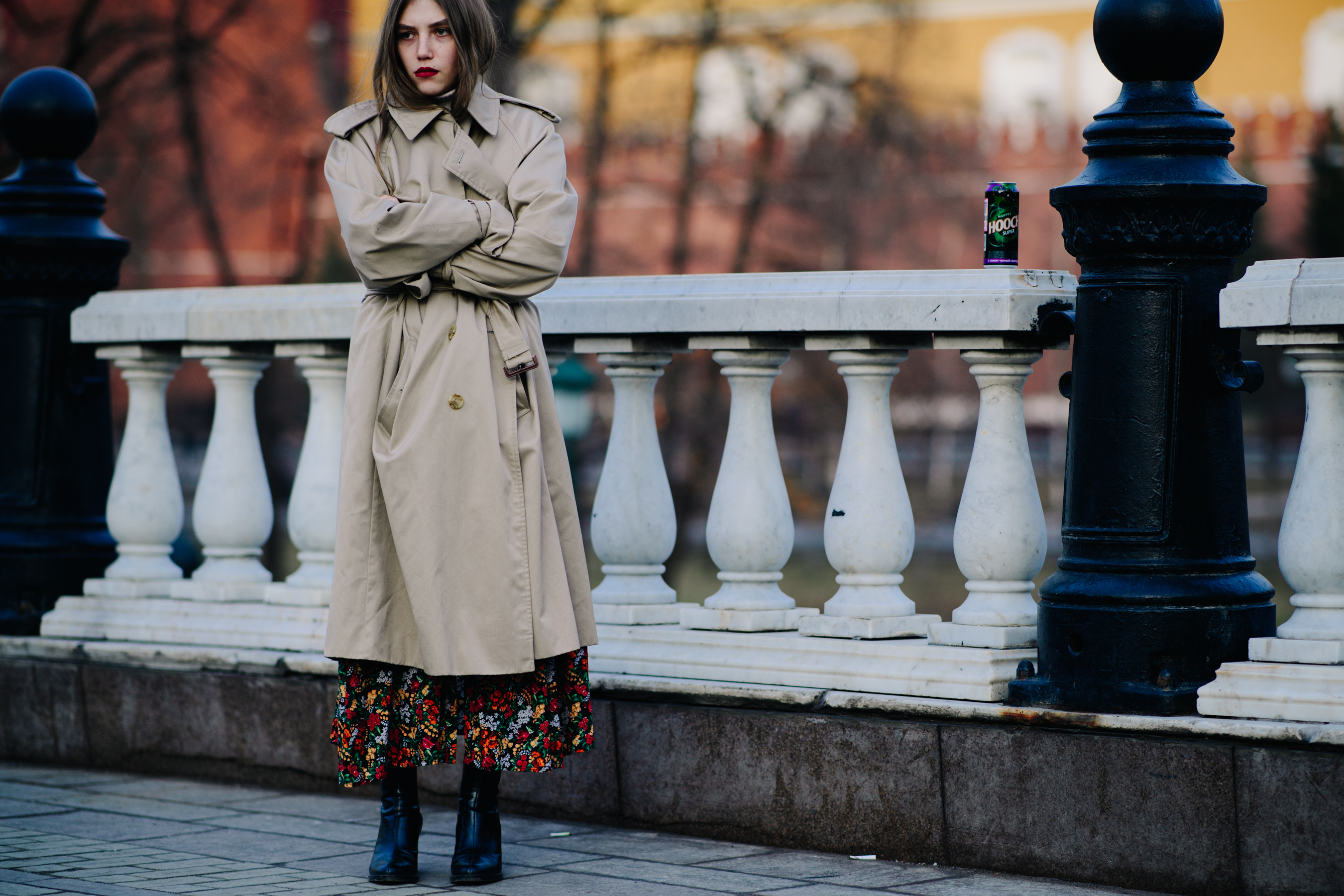 Woman wearing long beige coat