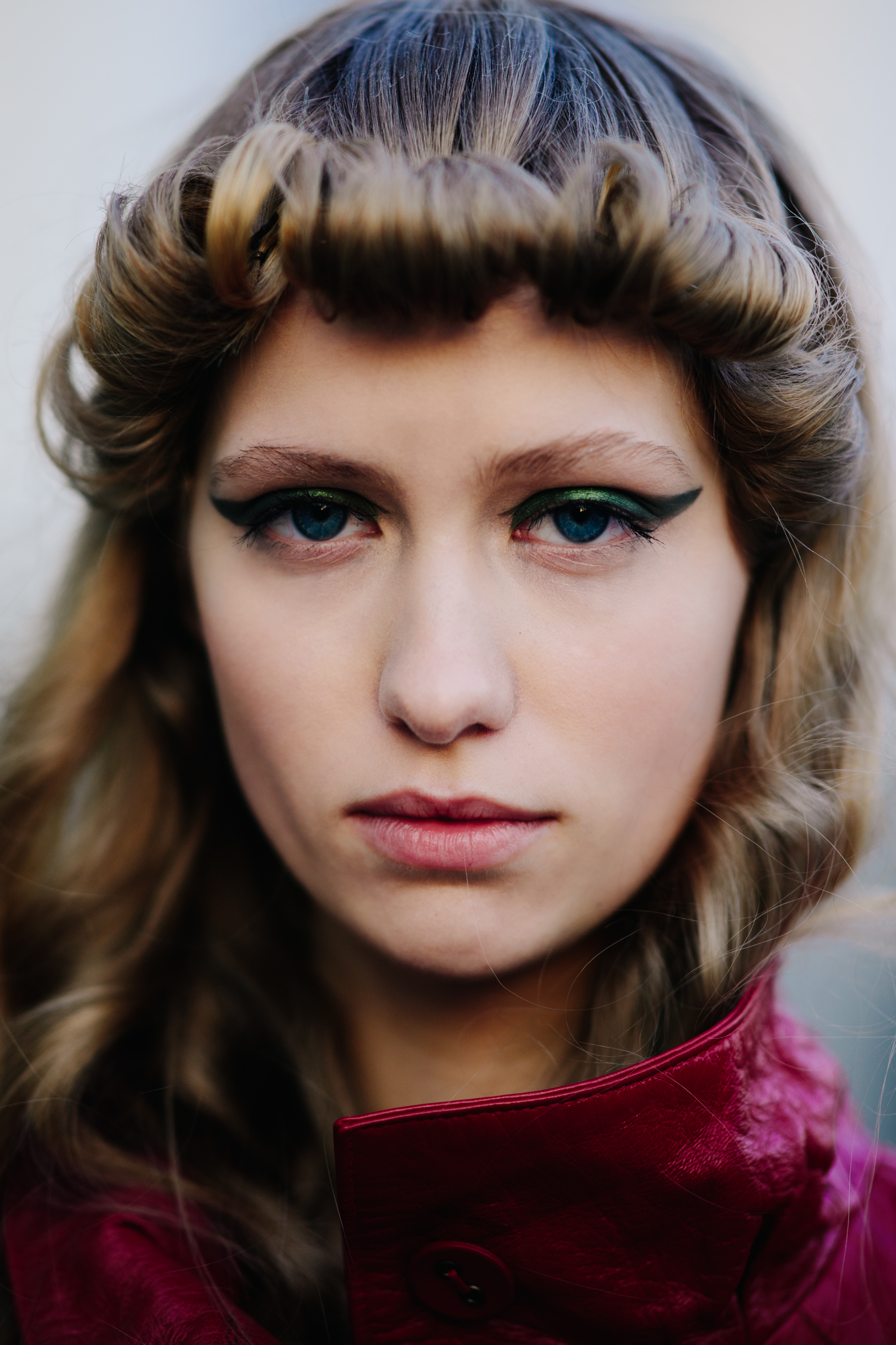 Portrait of a model with green make up