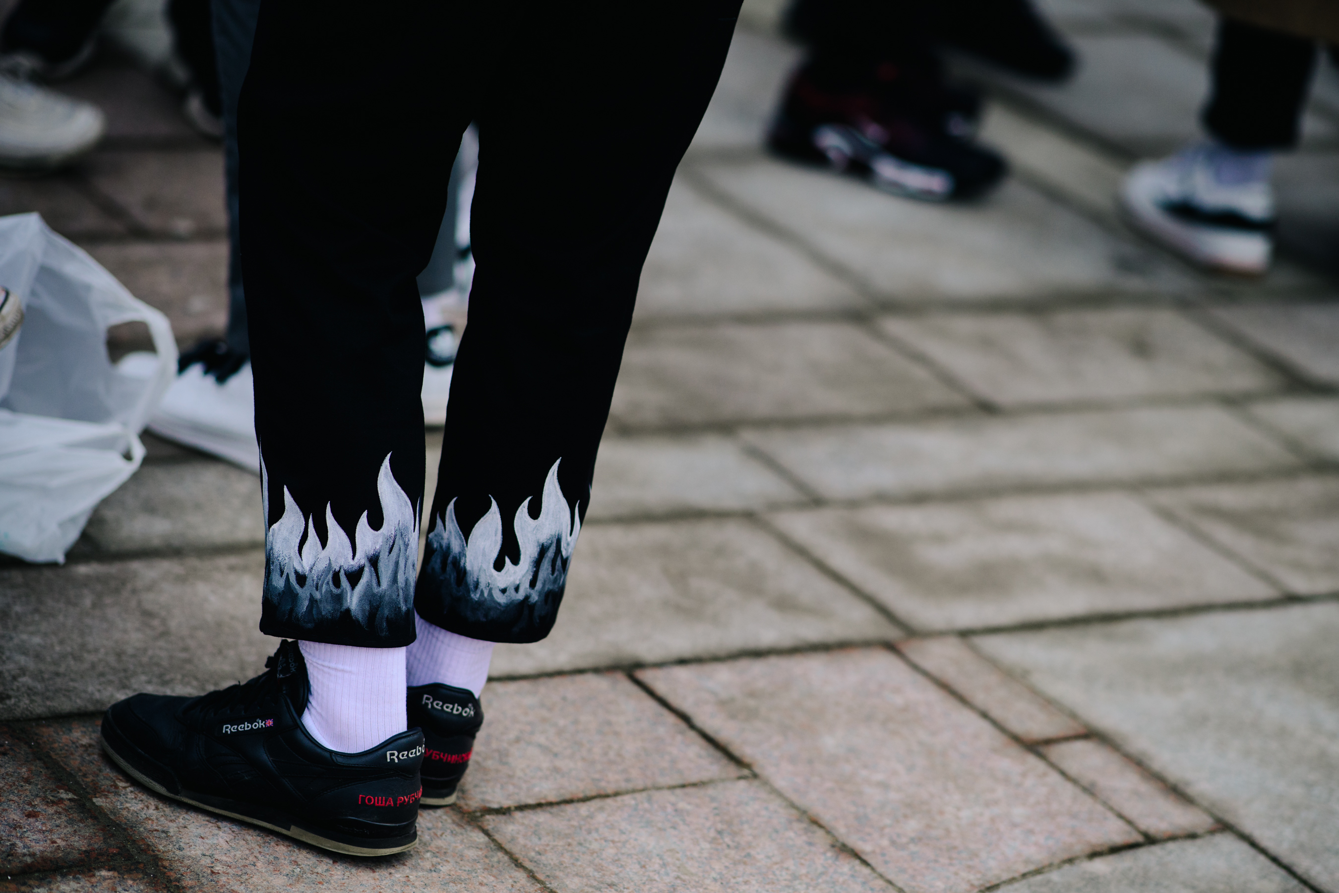 Boy wearing Gosha Rubchinskiy x Reebok sneakers