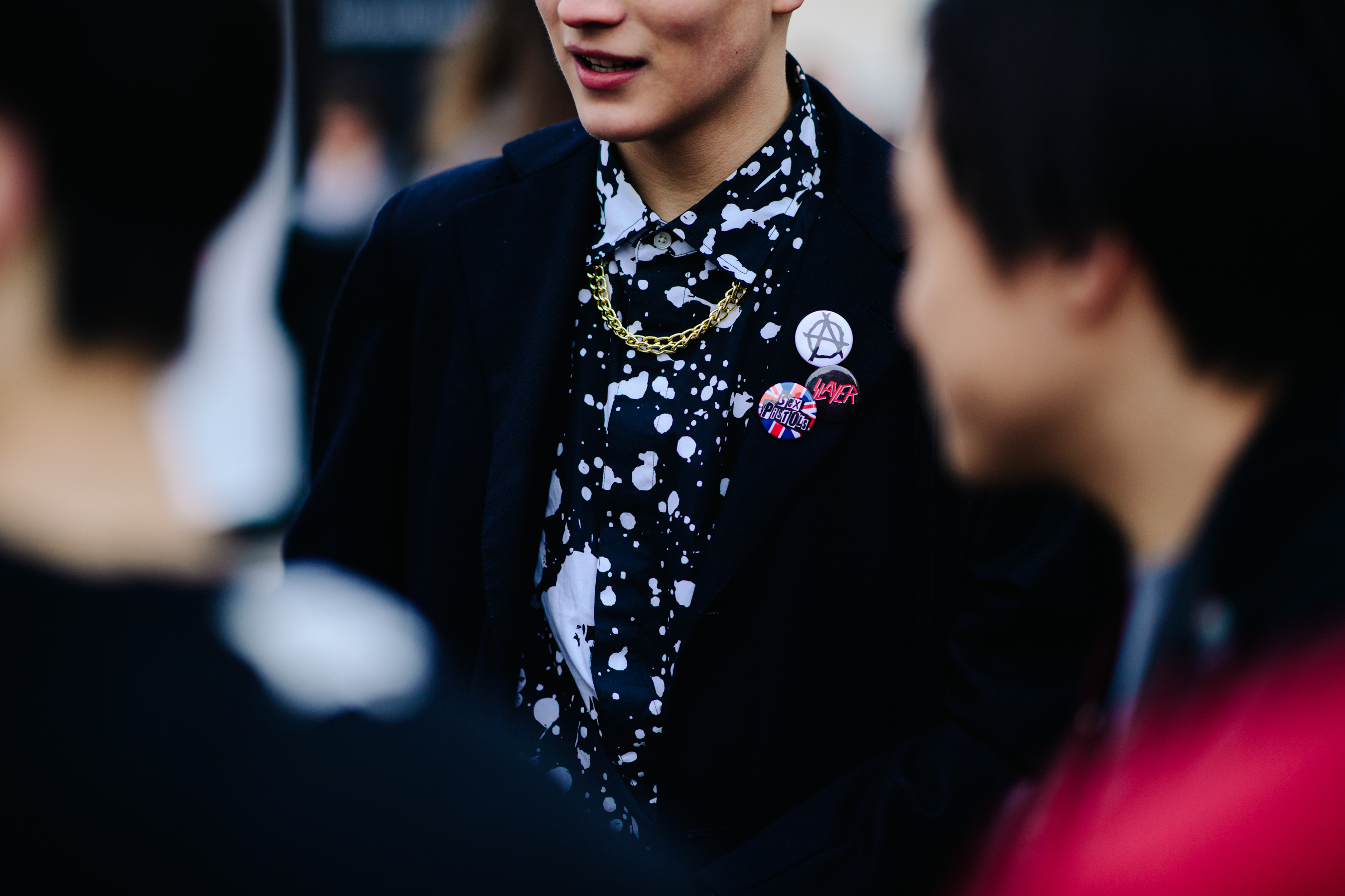 Boy wearing Raf Simons shirt