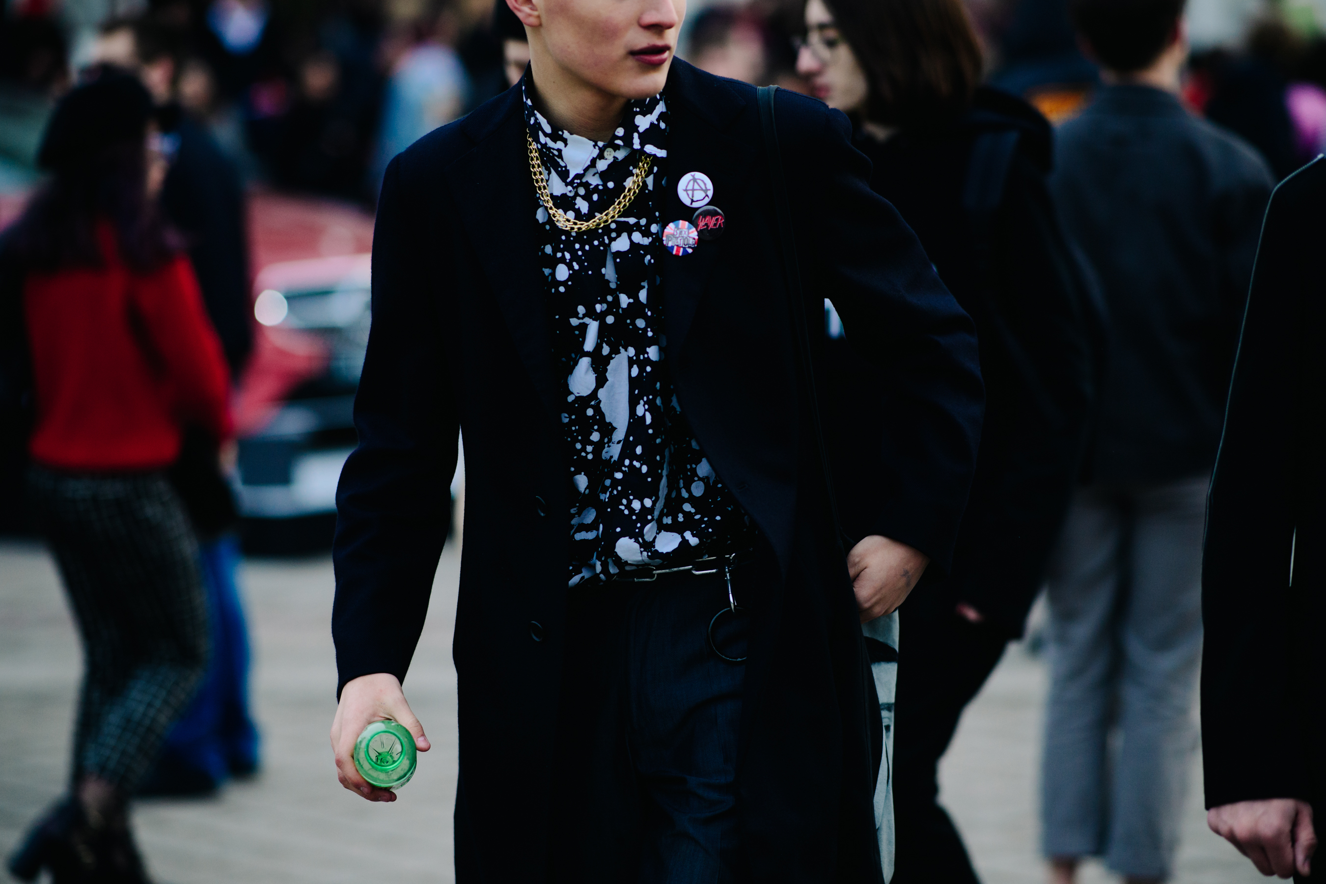 Man wearing Raf Simons shirt