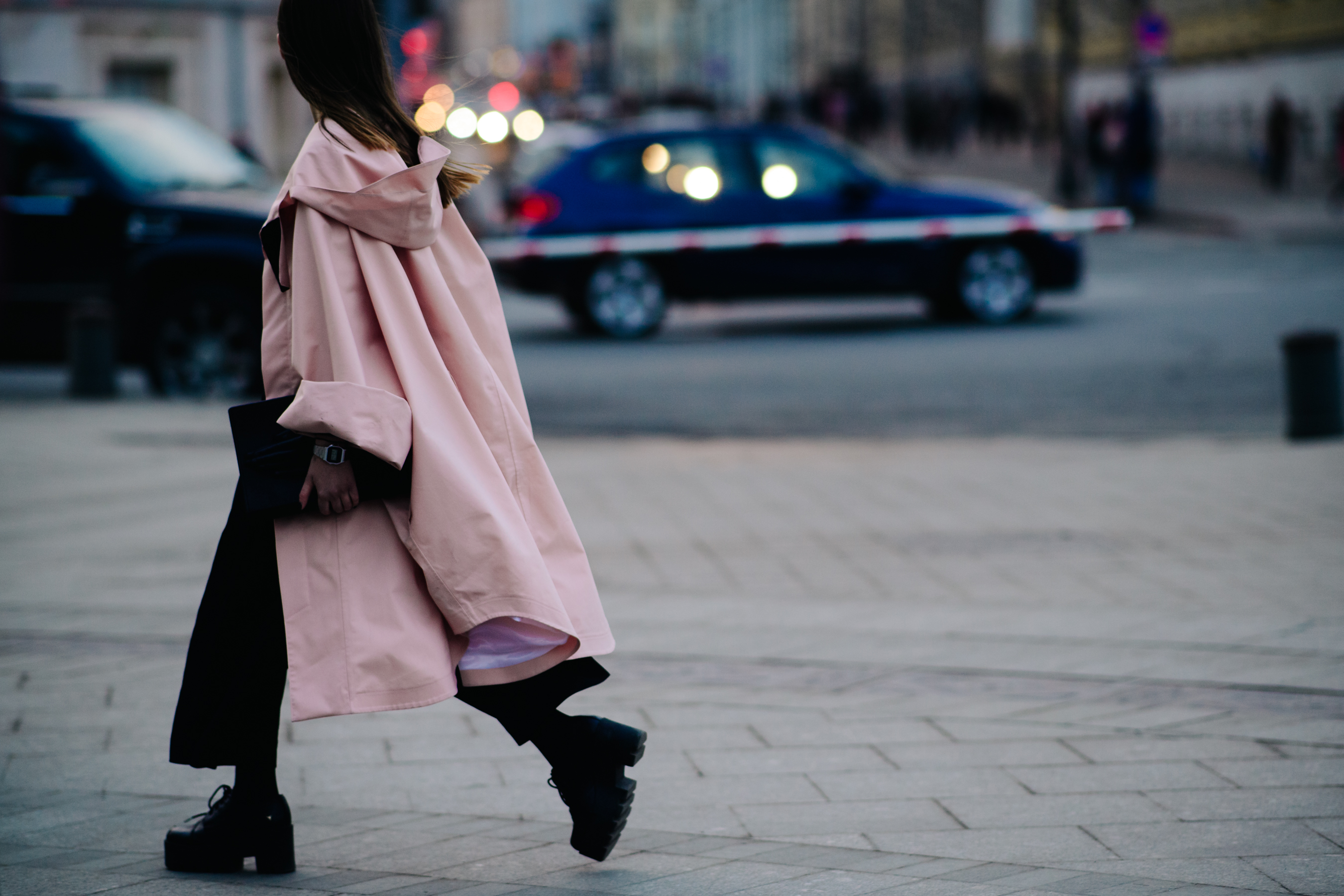 Woman wearing long pink coat