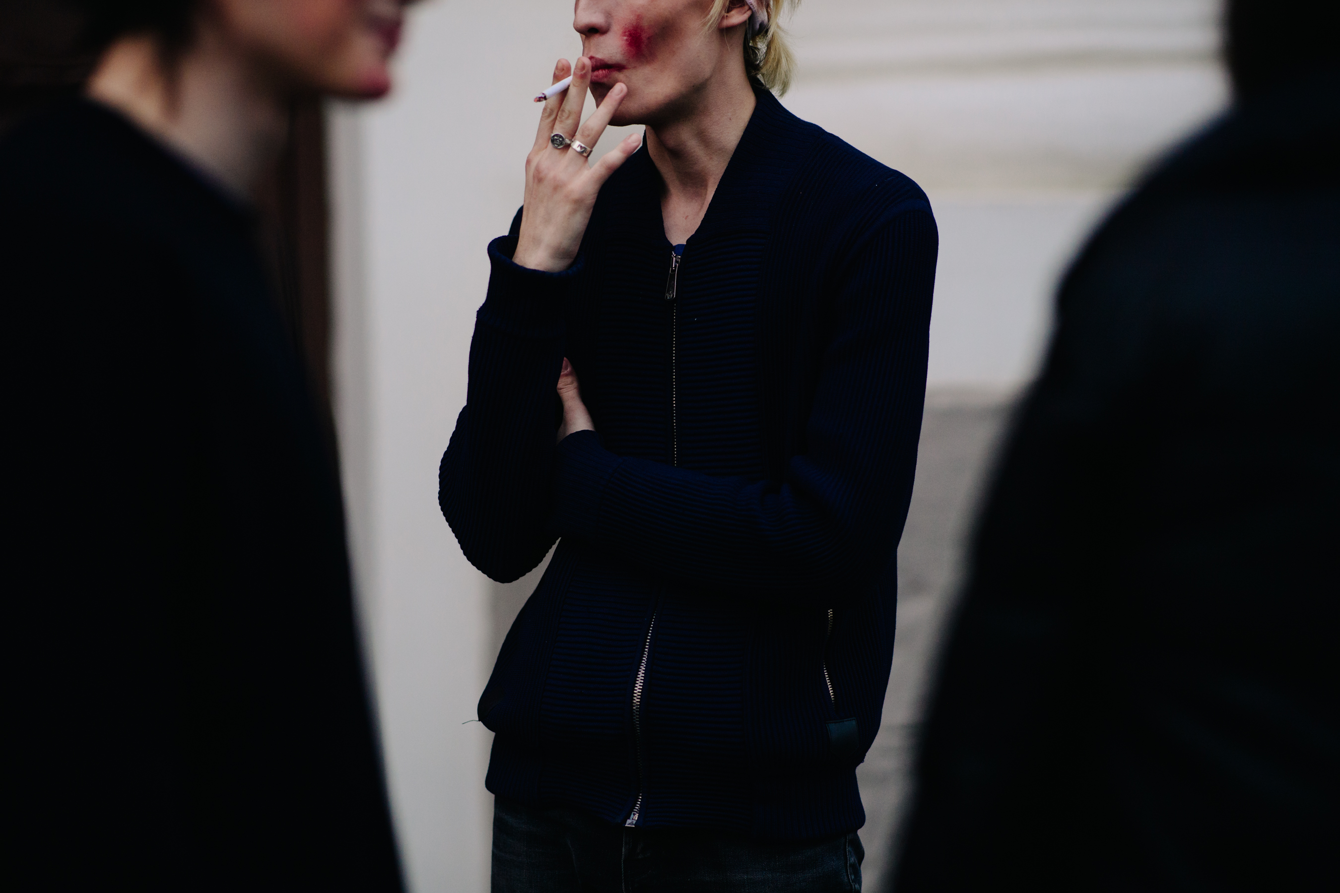 Man wearing make up smoking