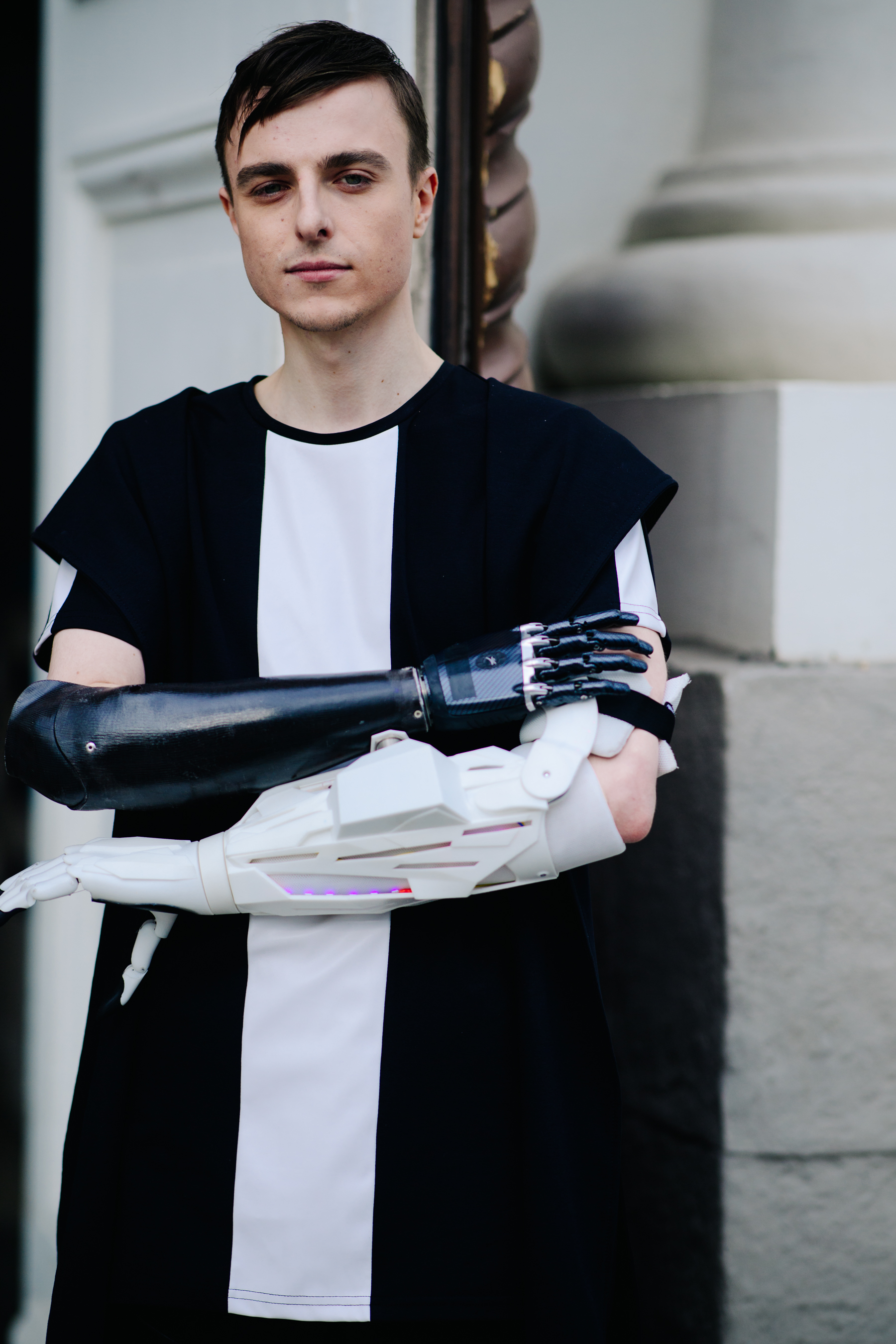 Man with futuristic bionic arms