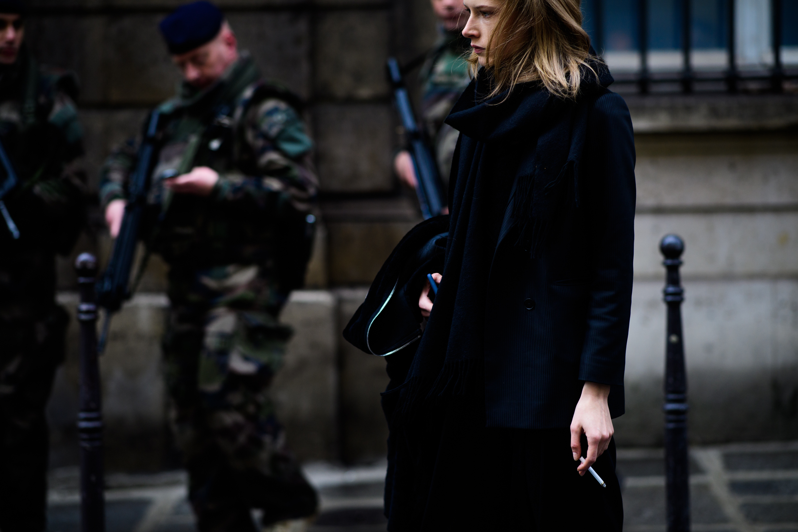Model wearing black coat
