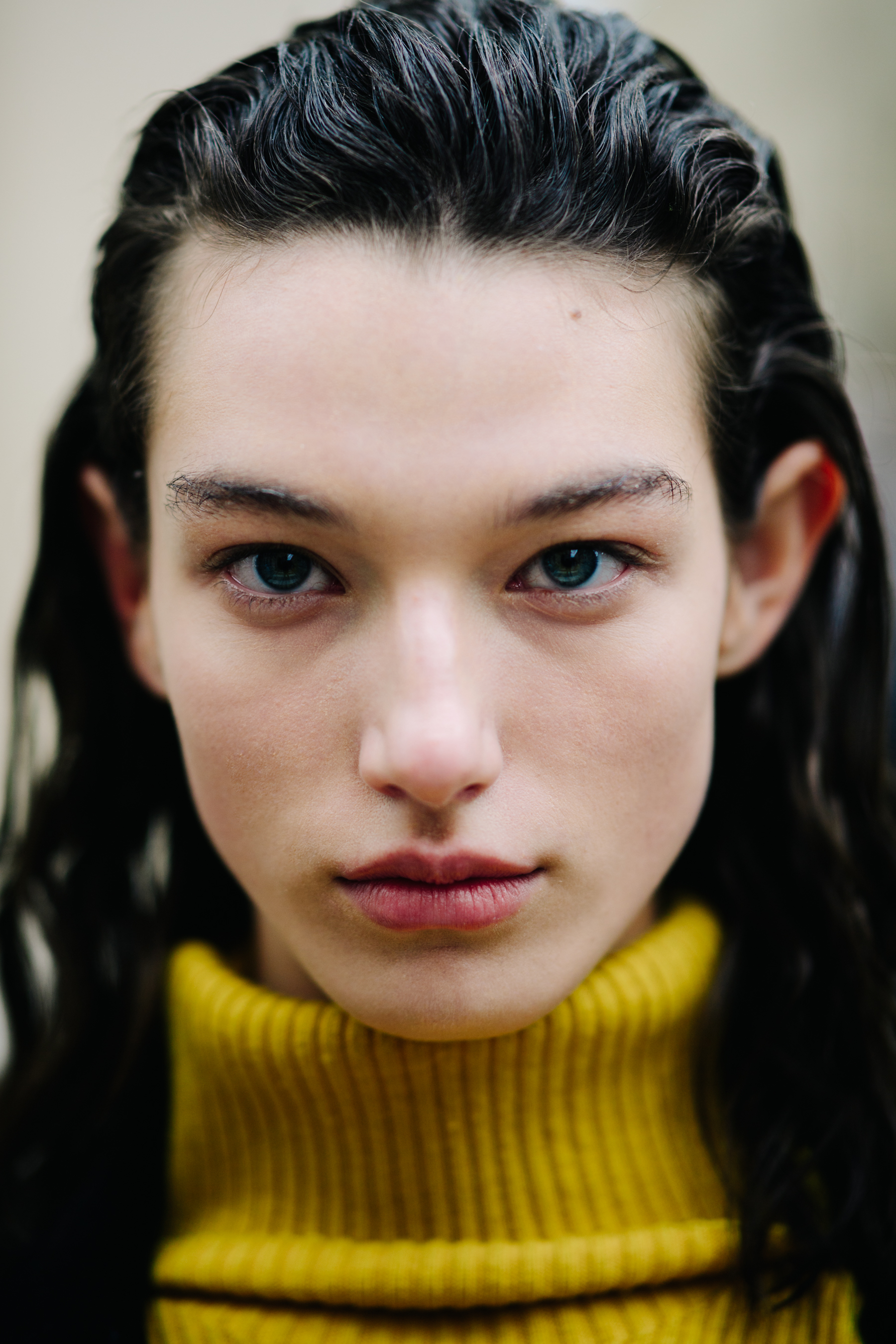 Portrait of a model in yellow sweater