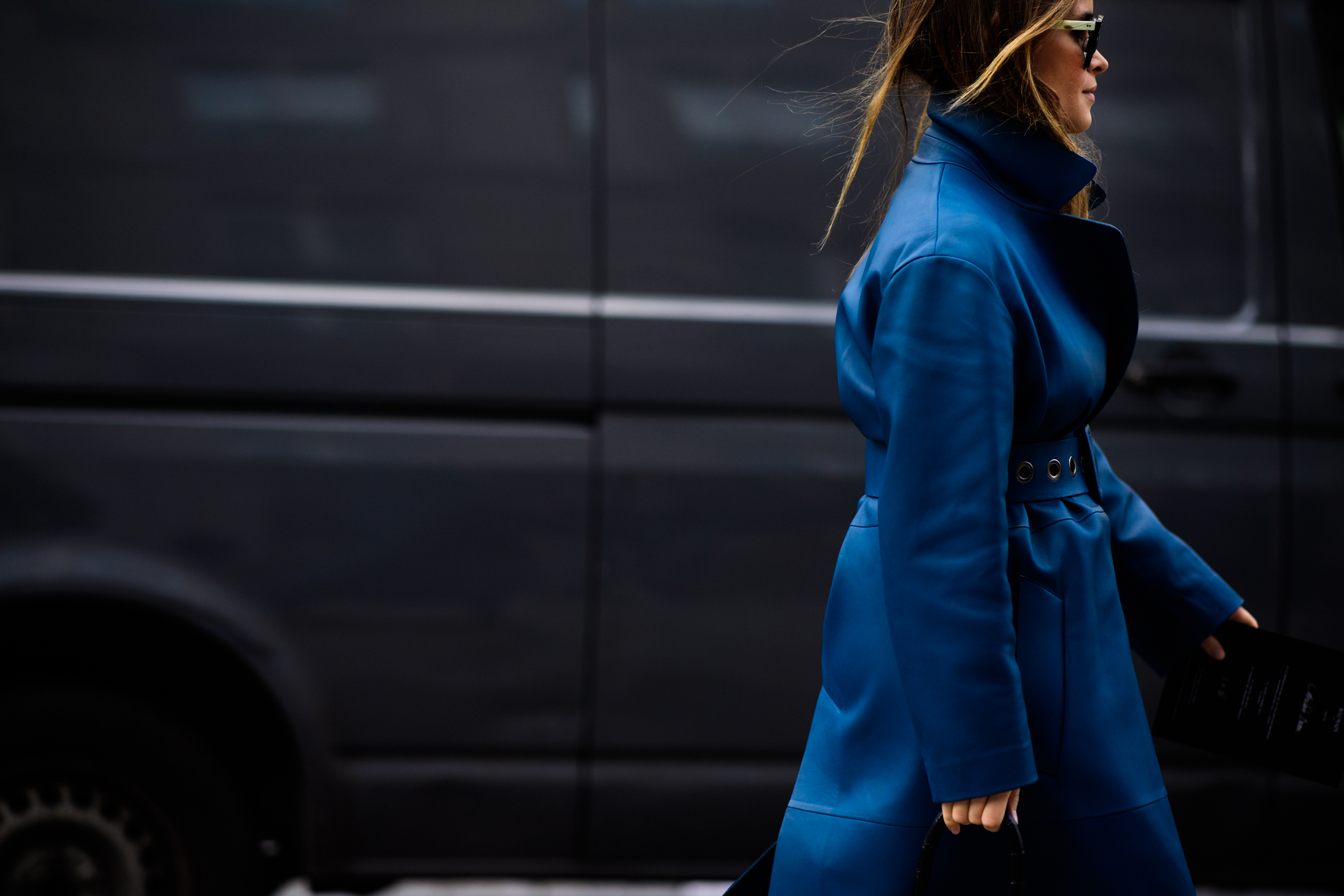 Russian editor wearing blue leather coat