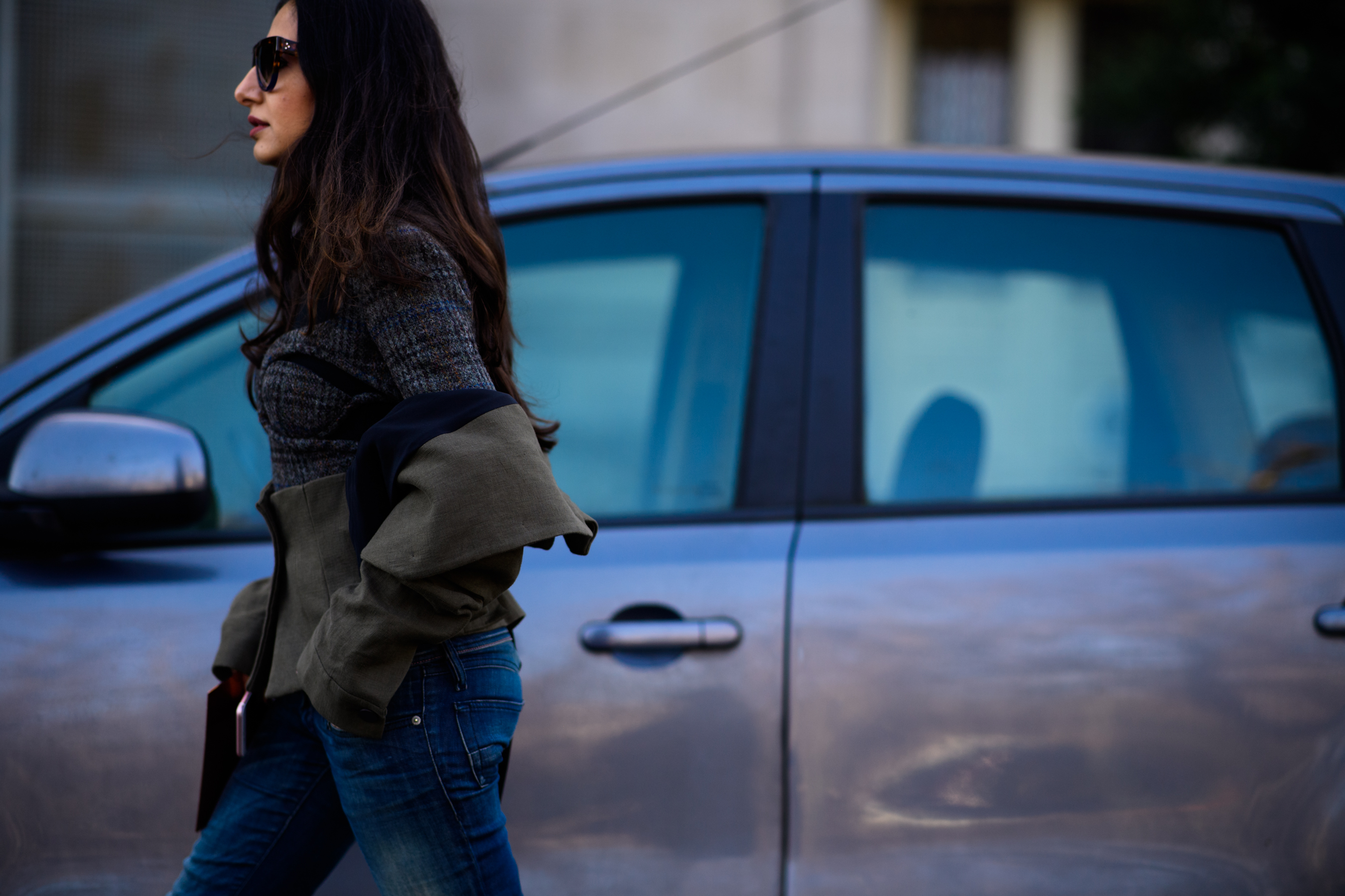 Editor wearing grey coat