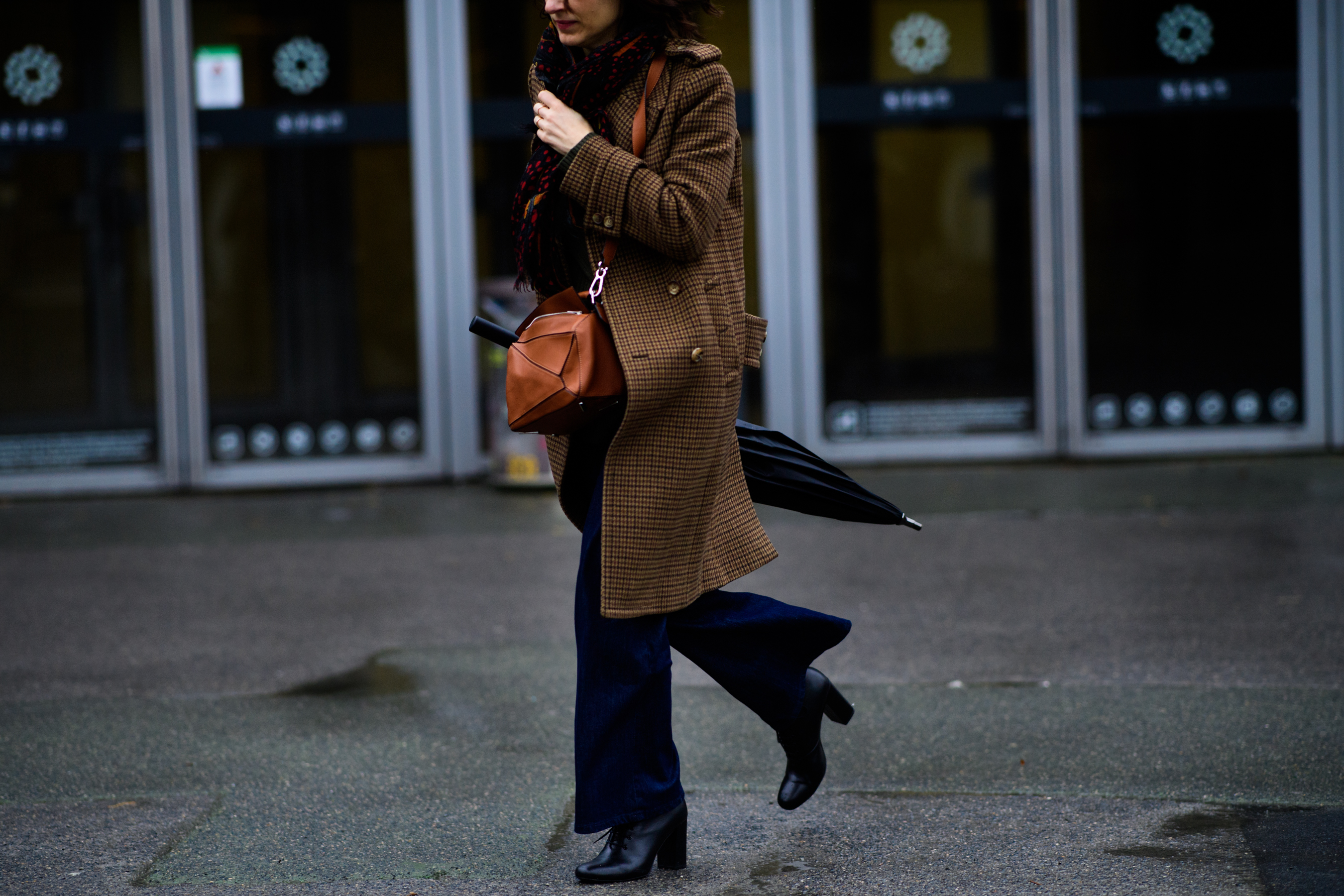 American journalist wearing Loewe bag