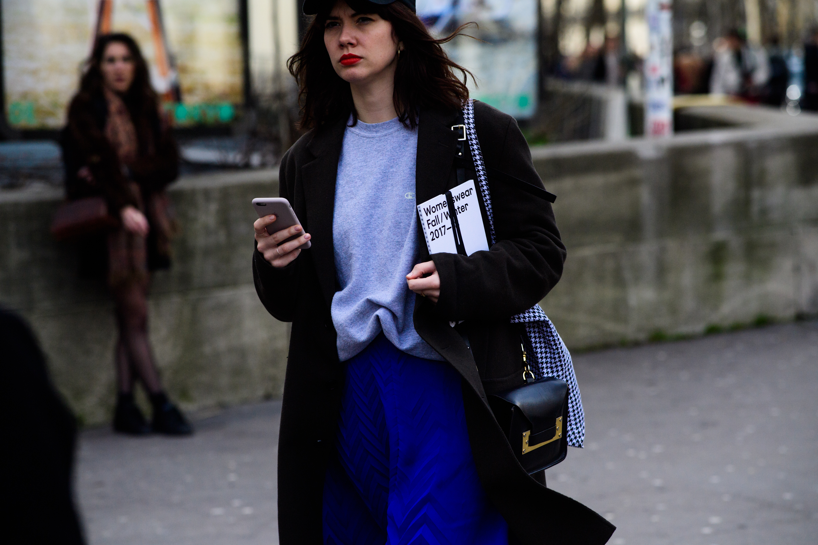 Woman wearing Champion hoodie