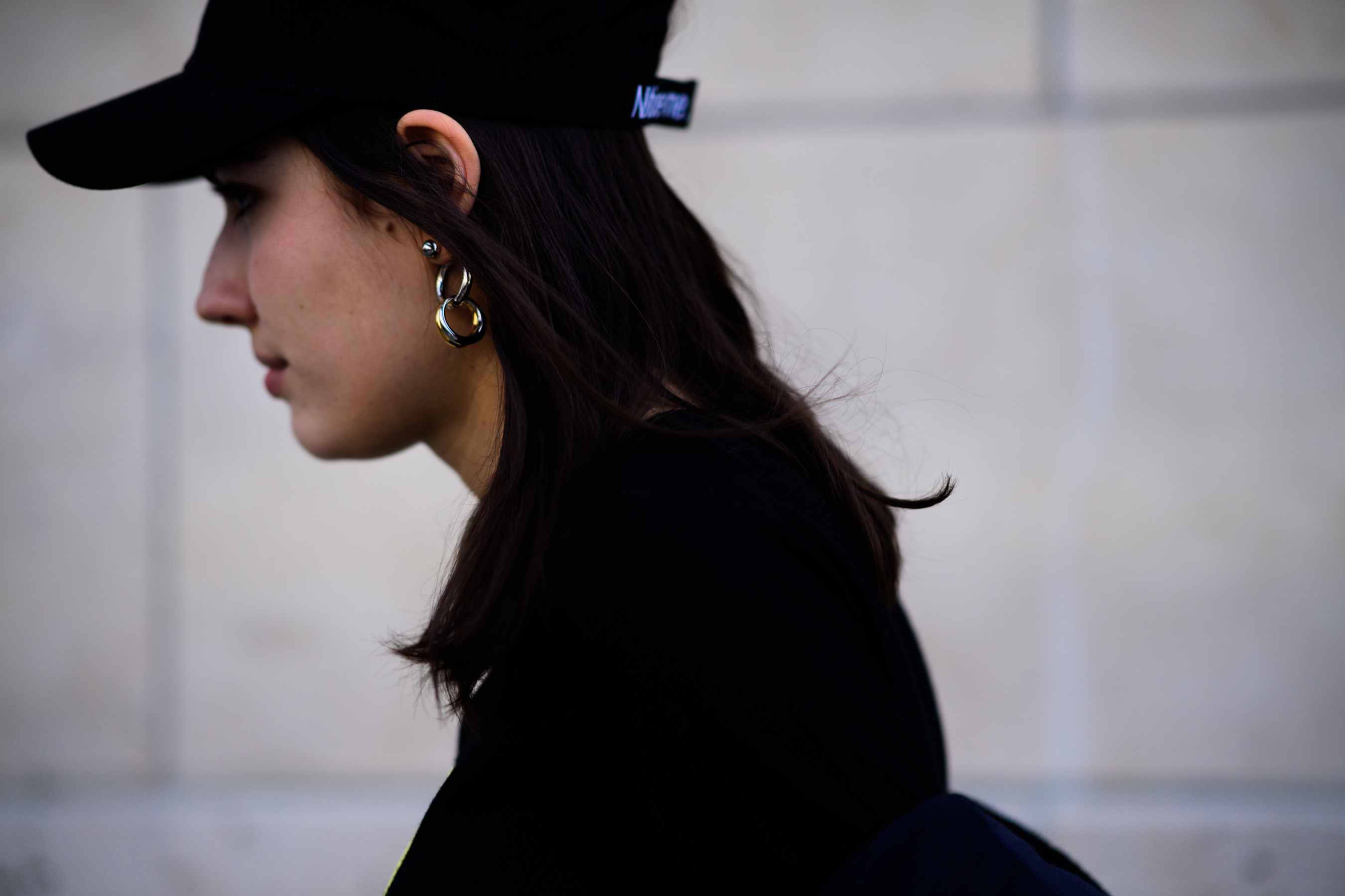 Italian woman wearing Notice me hat
