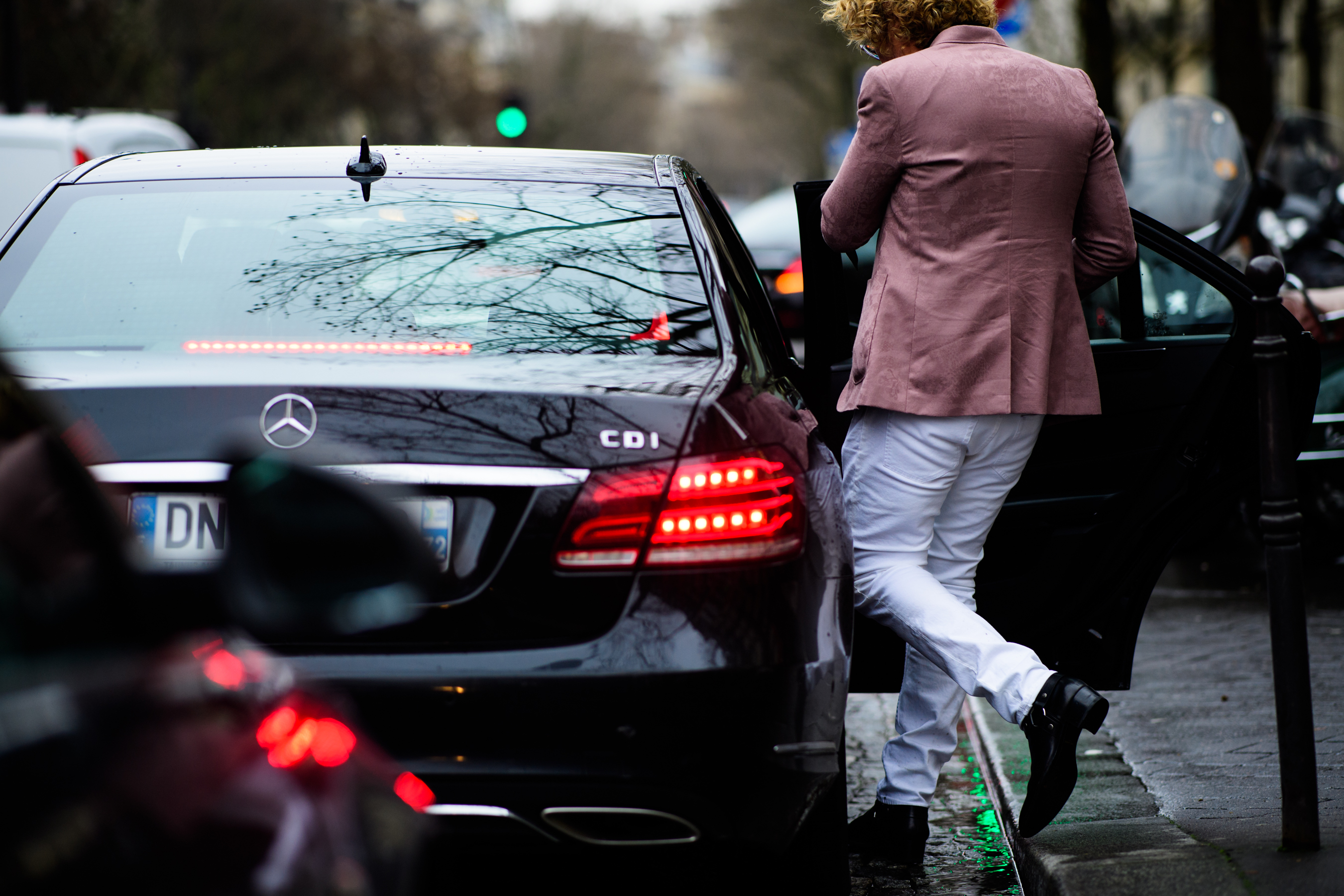 Designer wearing pink blazer