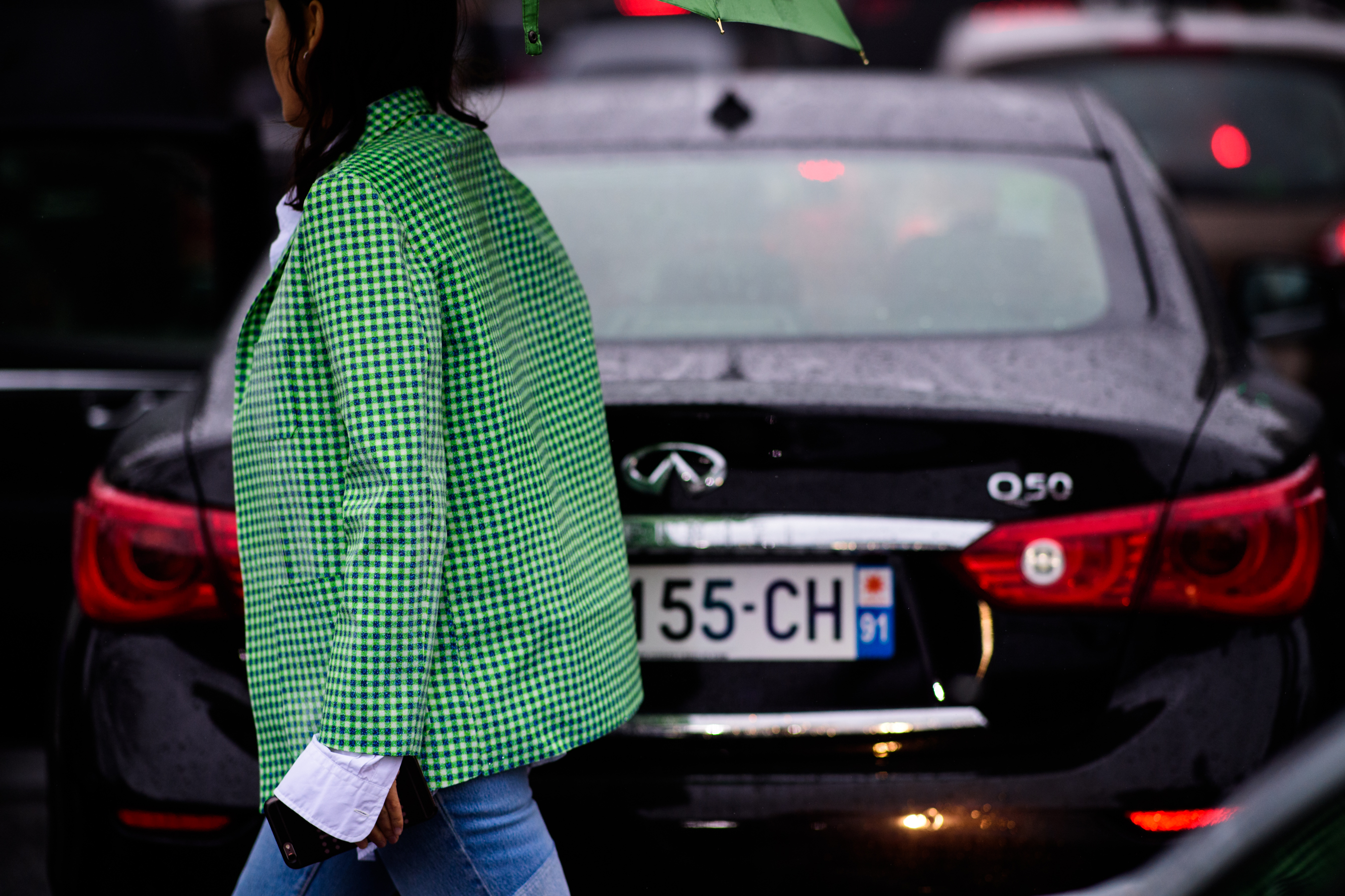 Allure editor wearing green jacket