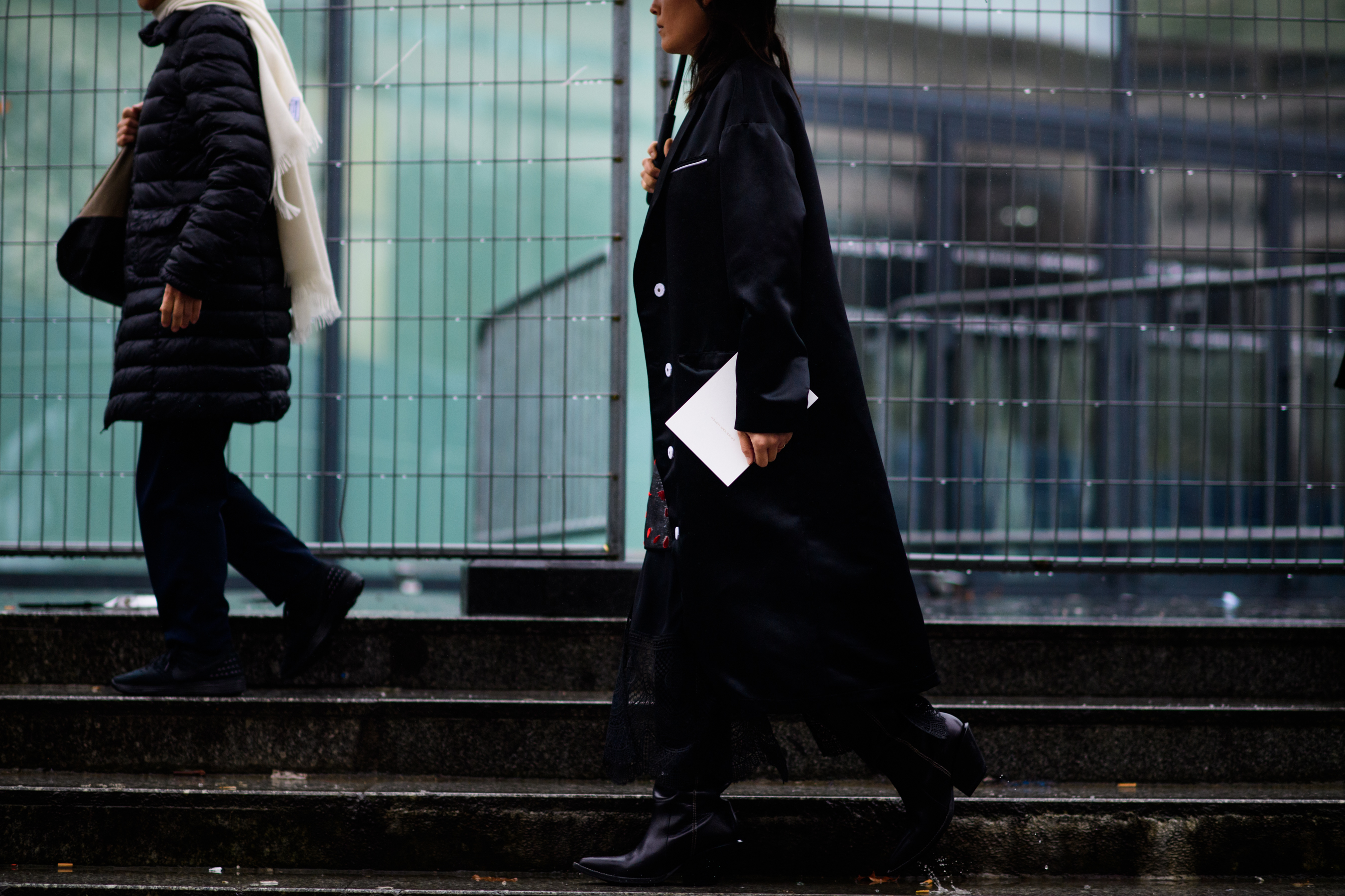 American editor wearing all black