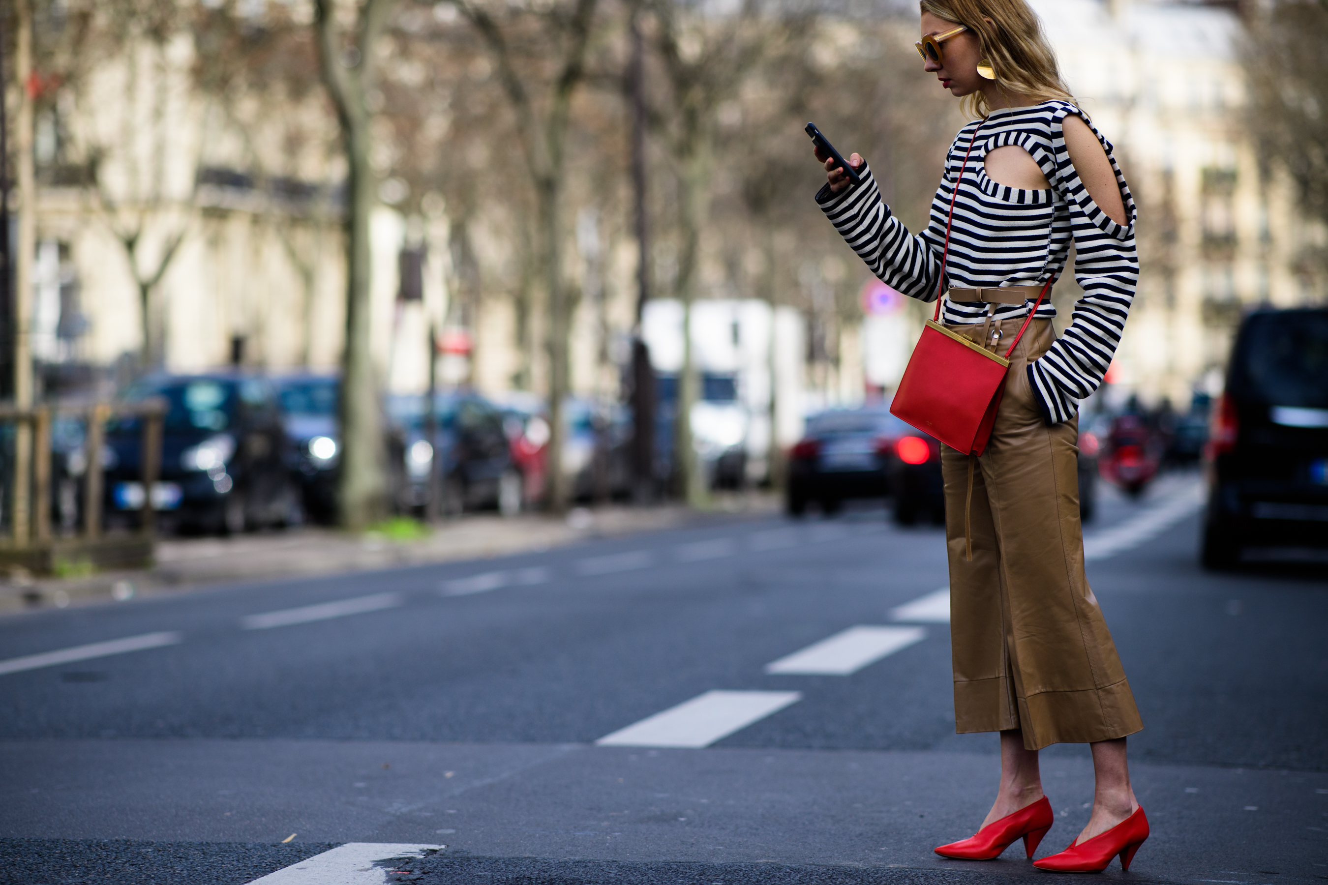 Buyer wearing red shoes