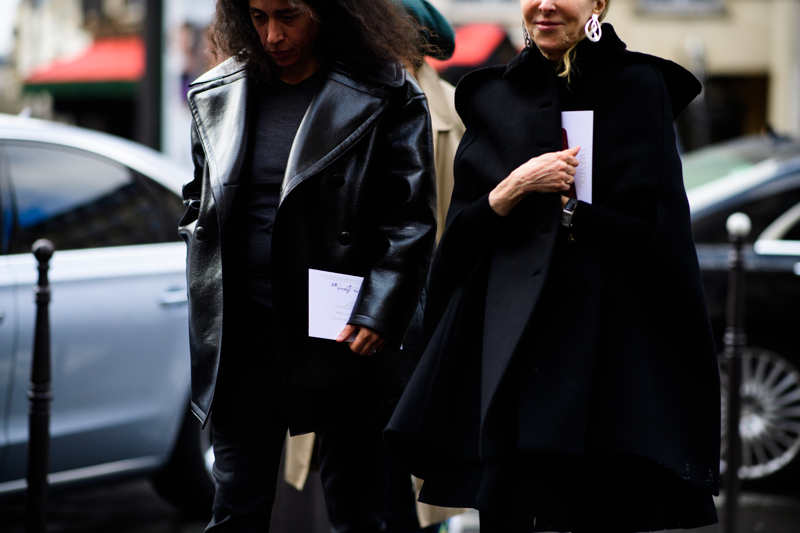Two women wearing all black