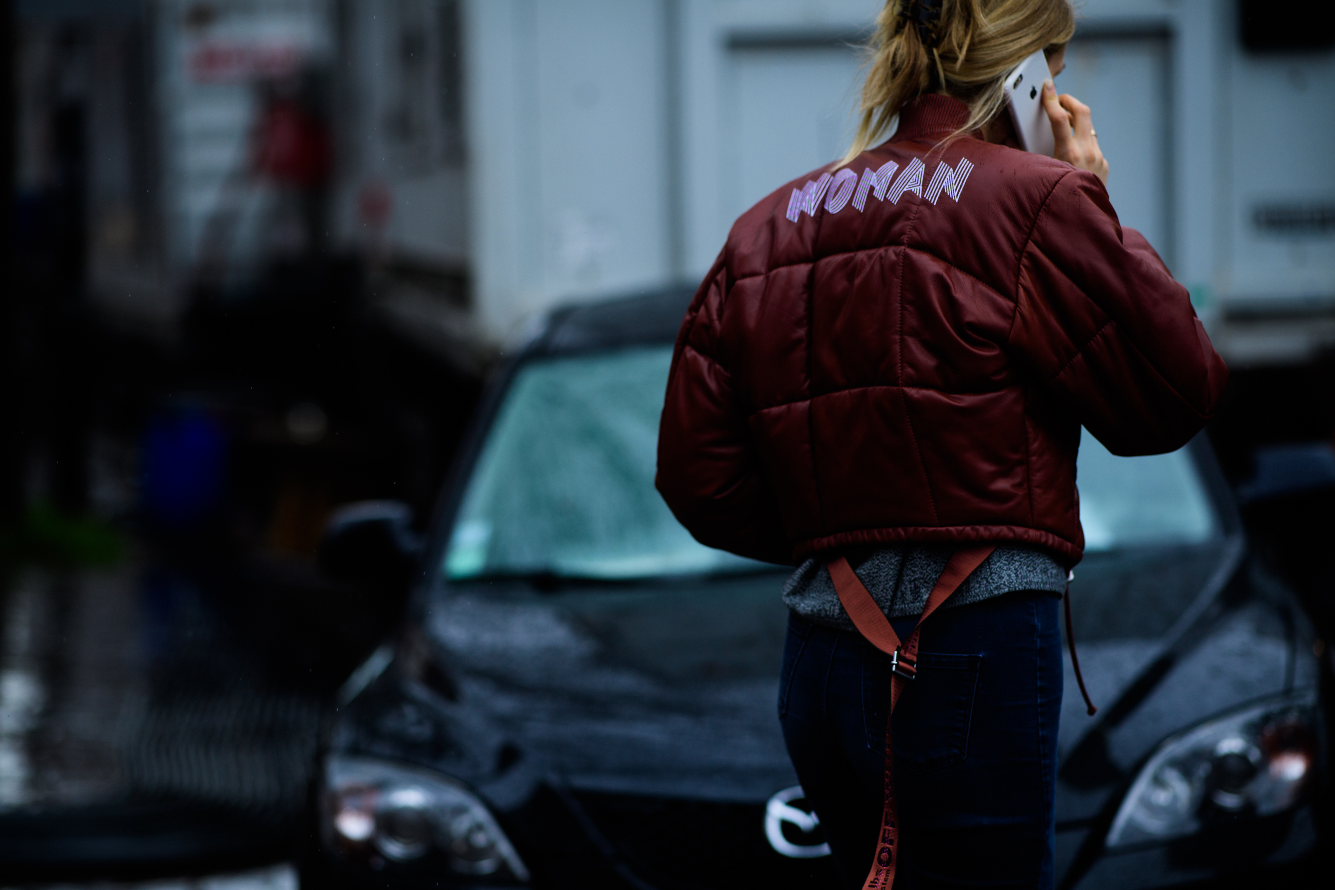 Woman wearing Off-White bomber jacket