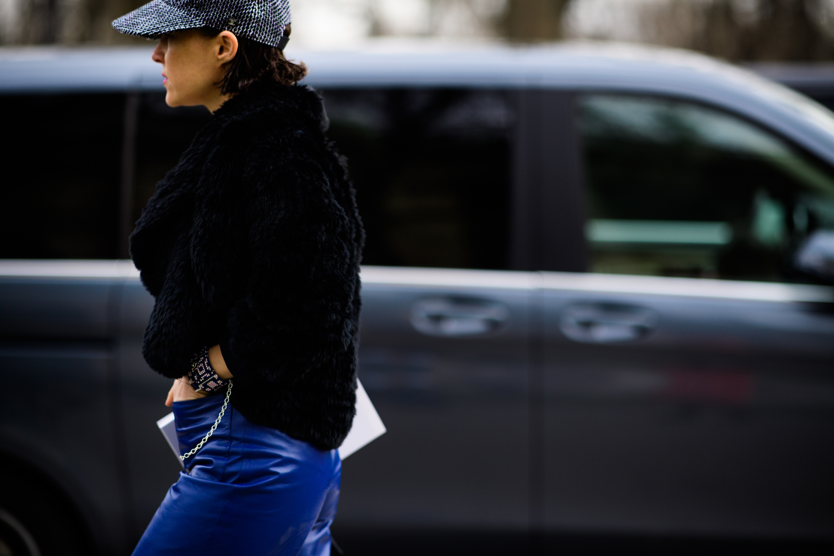 Woman wearing black fur coat