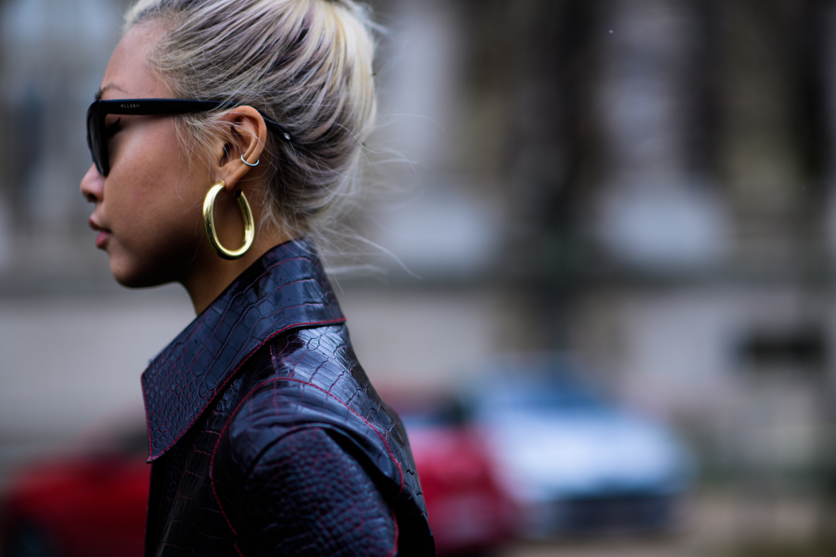 Blogger with blonde hair wearing leather coat